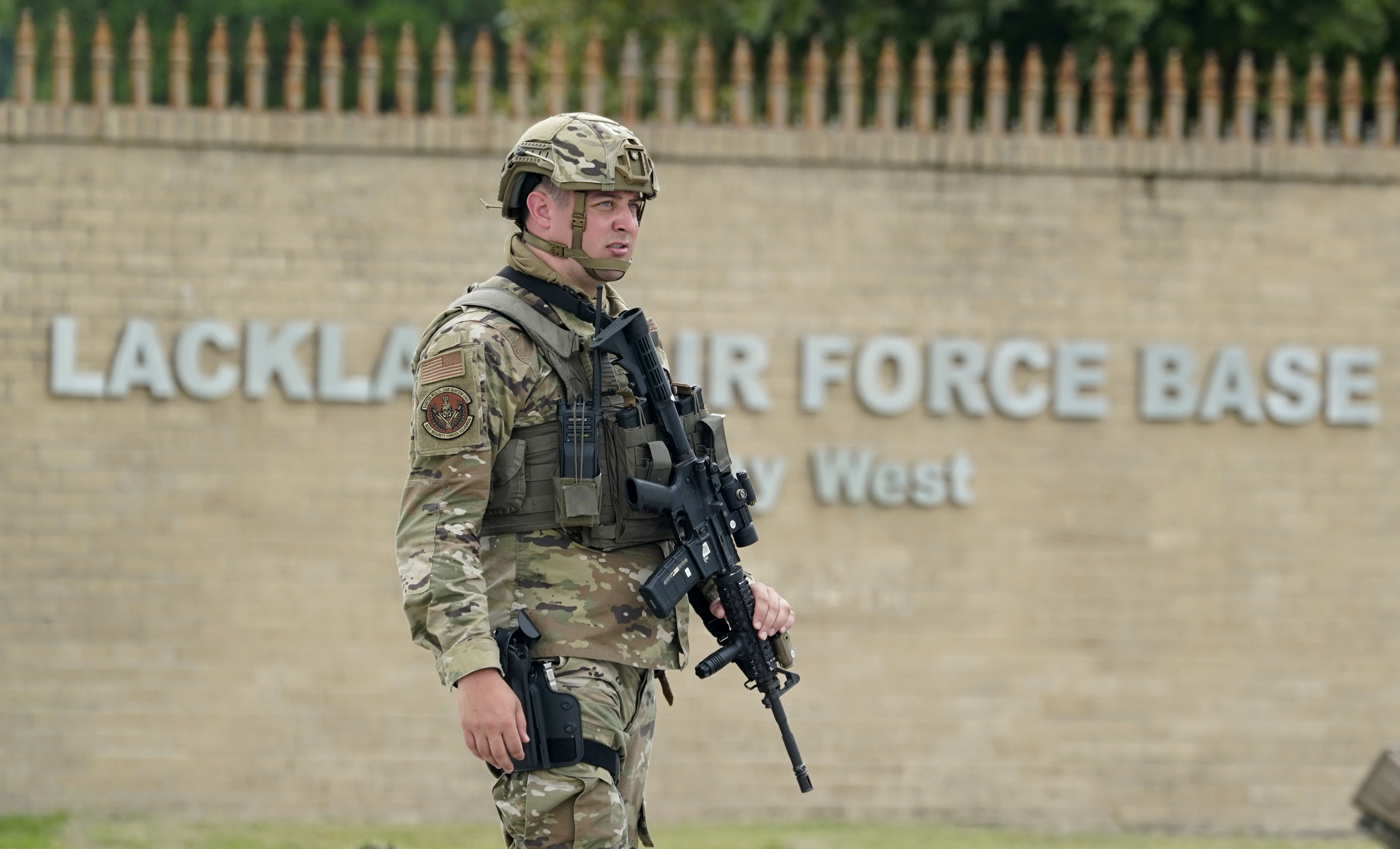 A San Antonio Air Force base was locked down for an hour after gunfire was  reported nearby