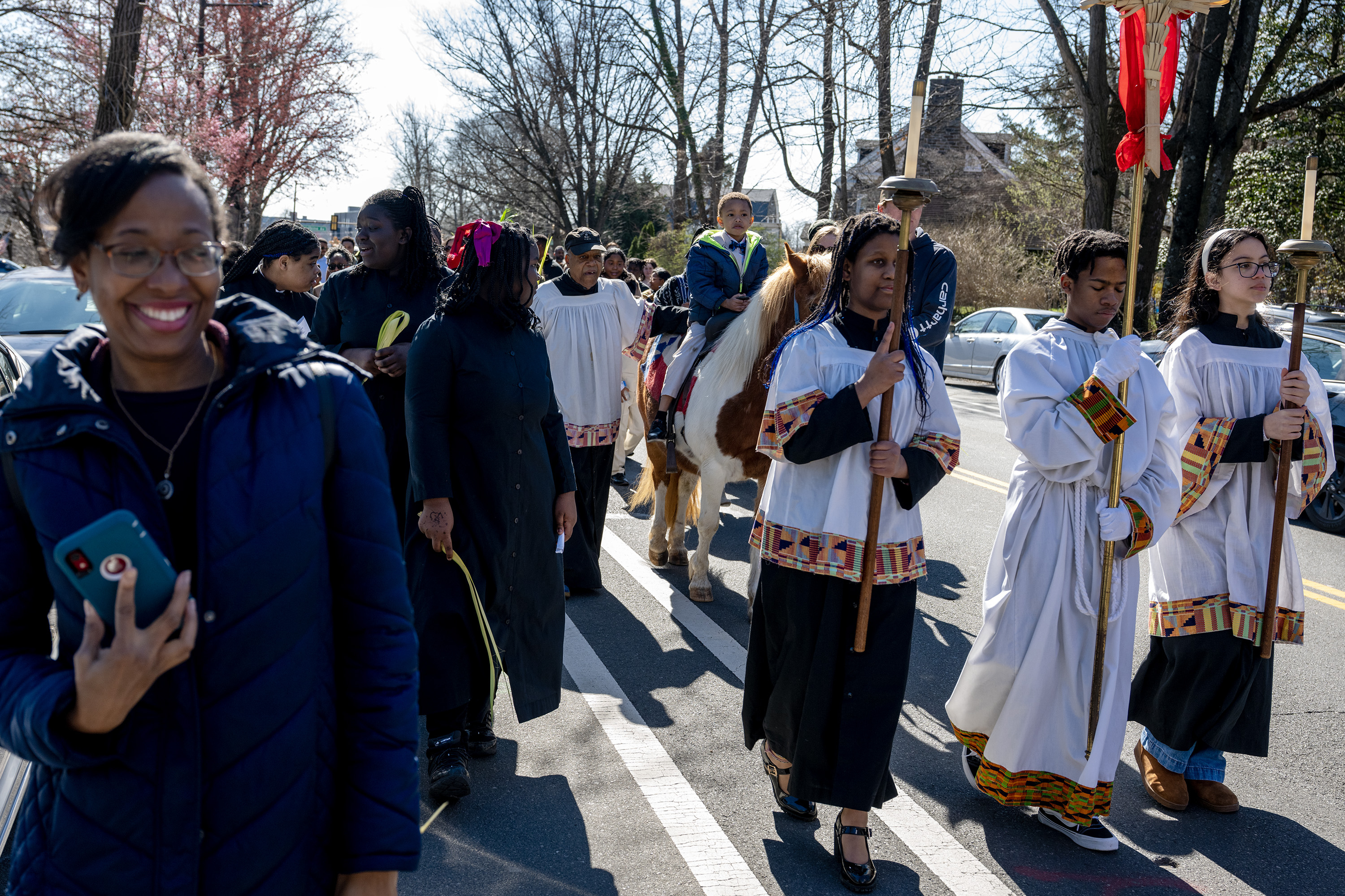 The African Episcopal Church held its Palm Sunday tradition of a donkey ...