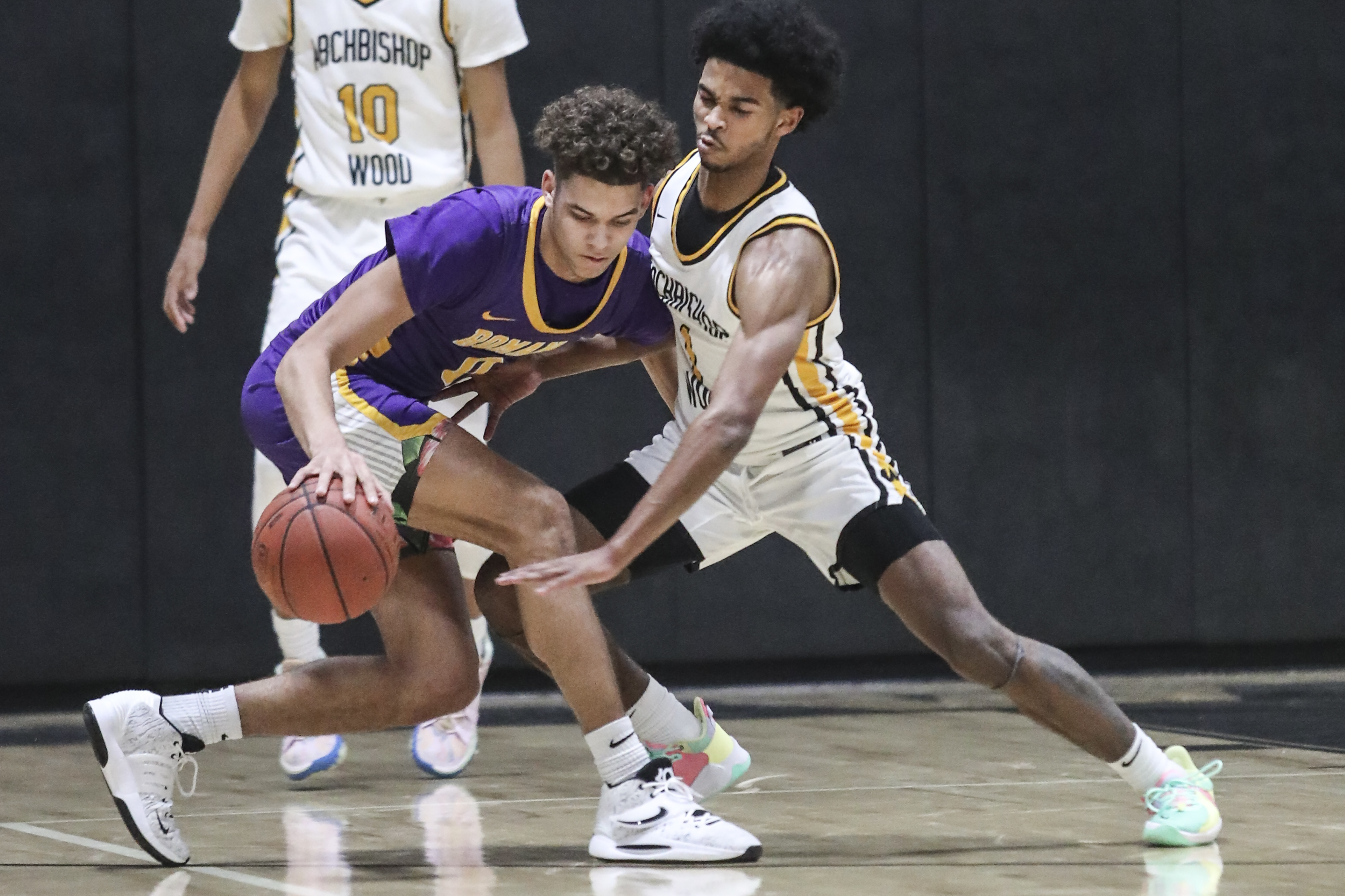 Roman Catholic claims state basketball championship over Archbishop Wood,  77-65