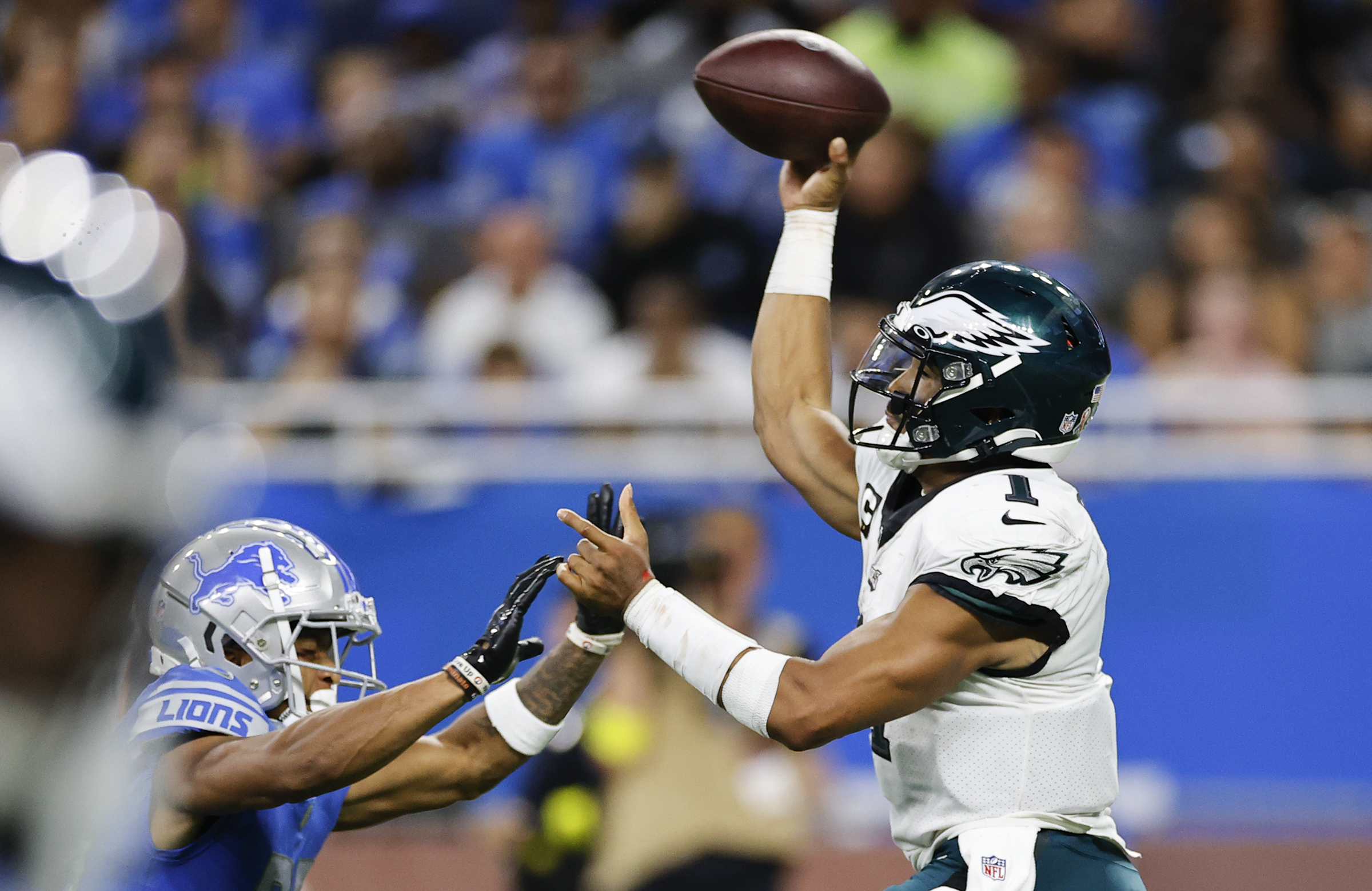 DETROIT, MI - SEPTEMBER 11: Philadelphia Eagles quarterback Jalen Hurts (1)  looks at the video board as he walks to the sideline at the end of the first  quarter during a regular