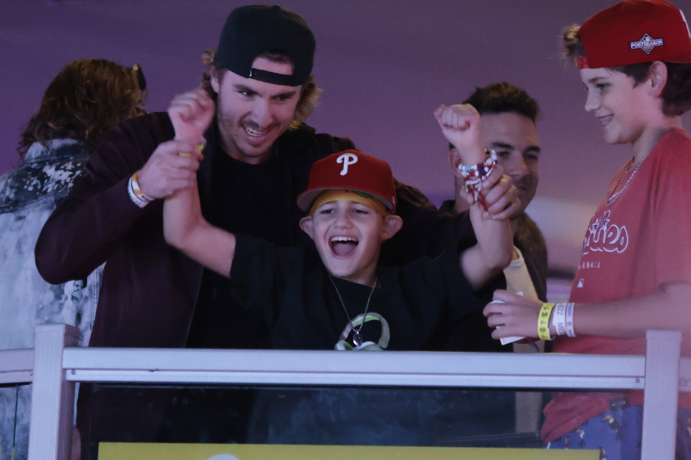 Nick Castellanos' son Liam embraced during Phillies NLCS celebration