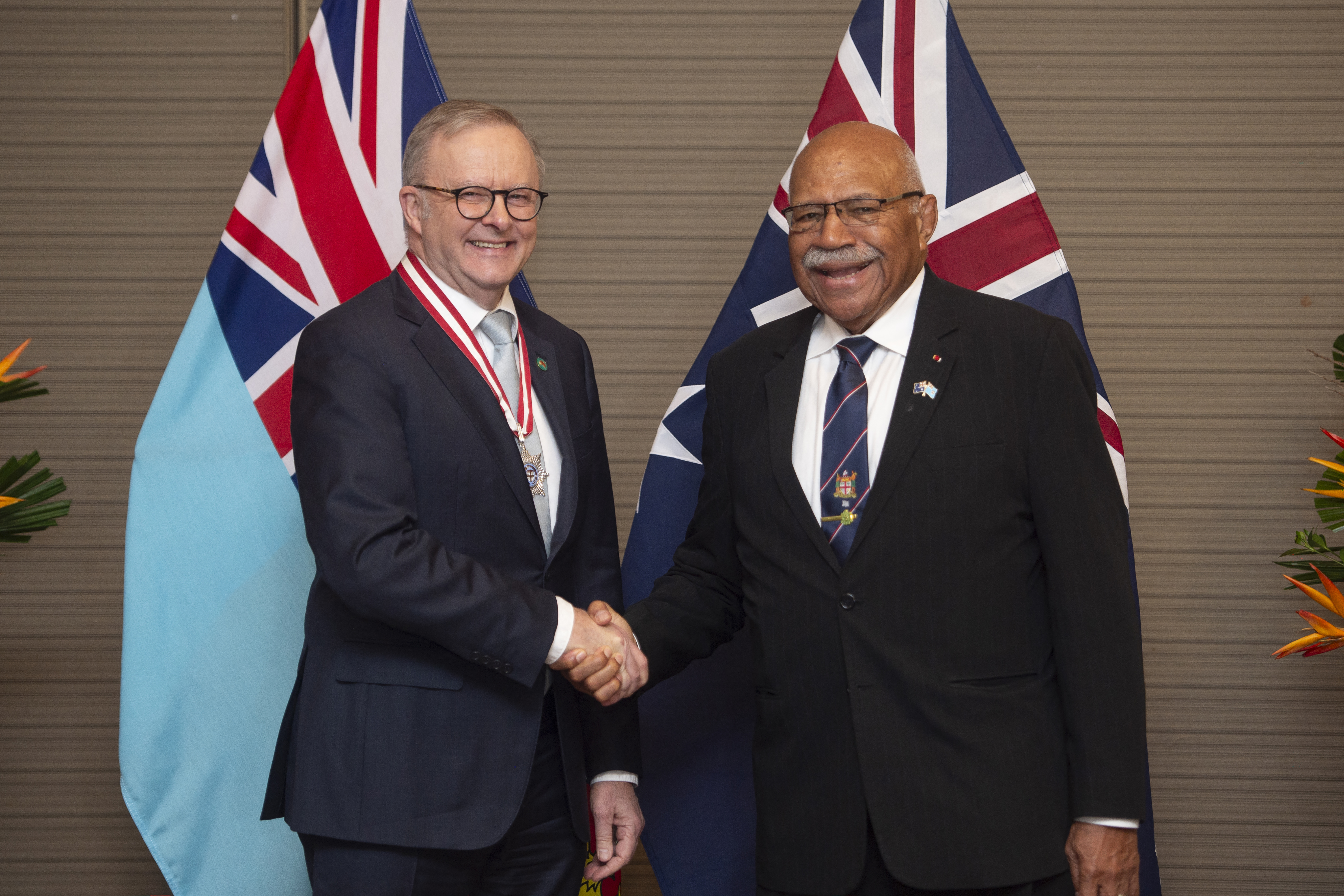 Australian Prime Minister Anthony Albanese shakes hands with Fiji's Prime Minister Sitiveni Rabuka before a bilateral meeting at the Grand Pacific Hotel in Suva on July 6, 2026.
