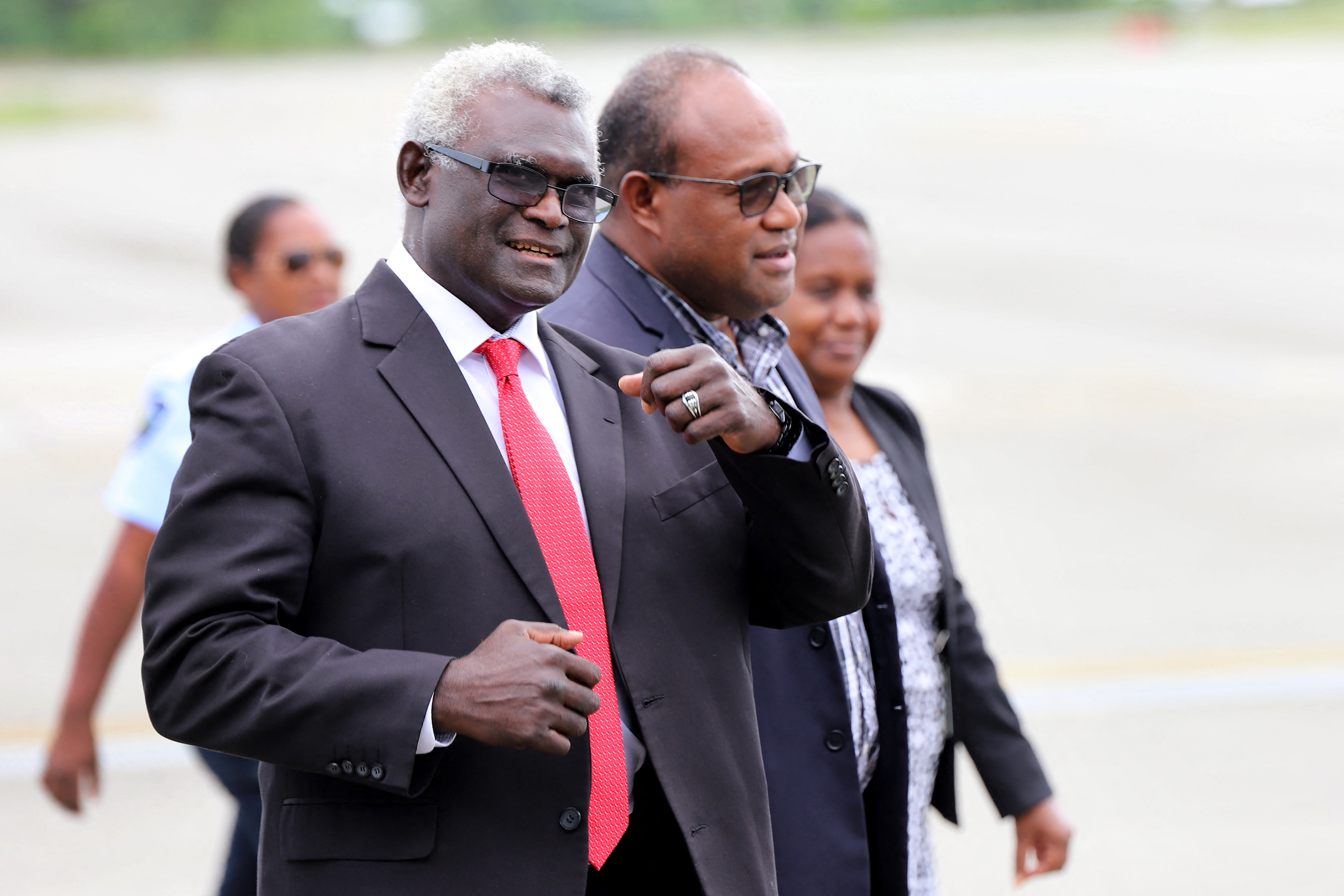 Solomon Islands' Deputy Prime Minister Manasseh Maelanga, right, receives Solomon Islands' Prime Minister Manasseh Sogavare in Honiara on July 17, 2023, after returning home from a seven-day trip to China. Maelanga filed a no-confidence motion against the leadership of current Prime Minister Matthew Wale, while Sogavare, as leader of the opposition, alleged that the no confidence motion was withdrawn due to foreign interference.