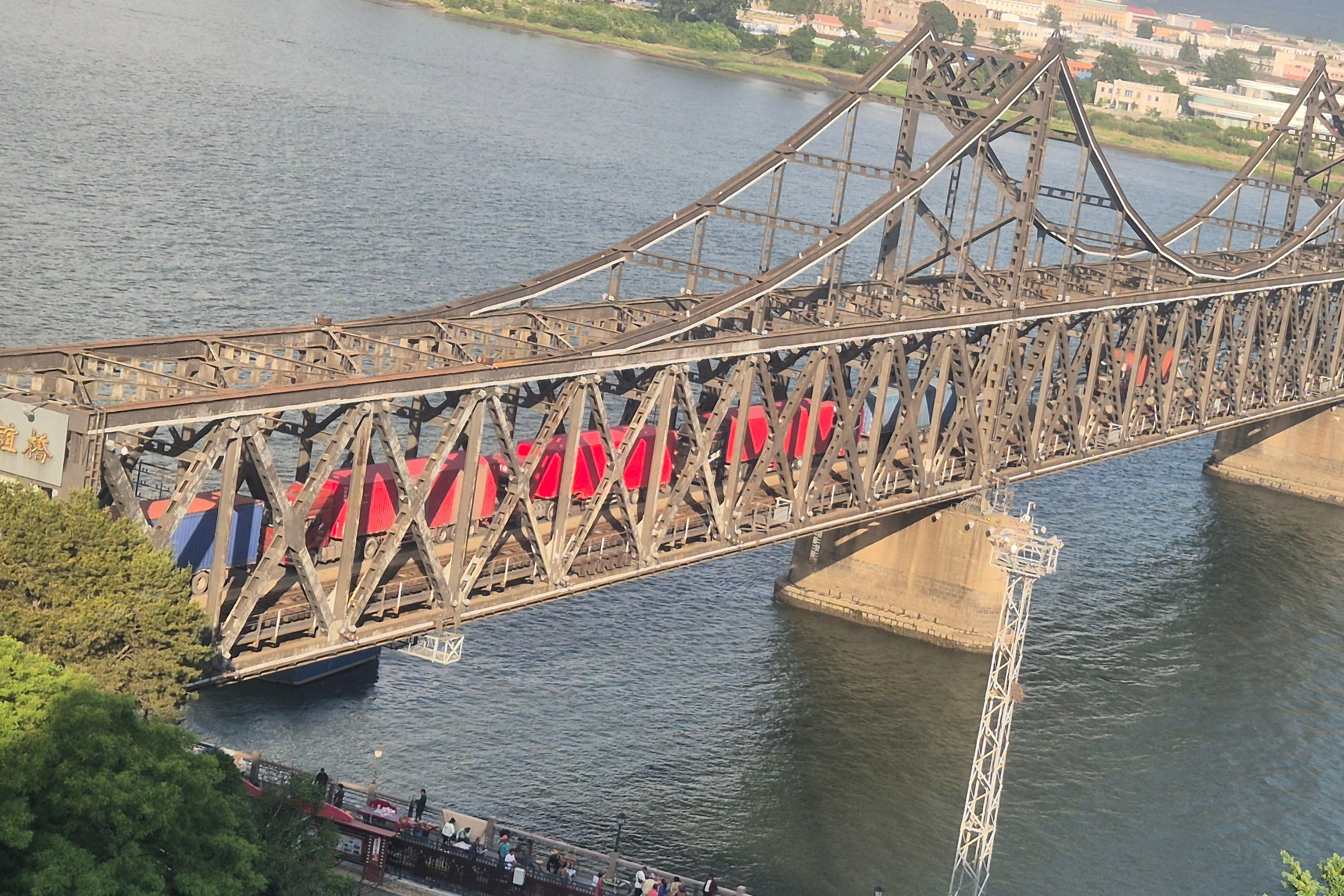 Freight trucks return from Sinuiju, North Korea, to Dandong, China in June. Courtesy Joung Eunlee