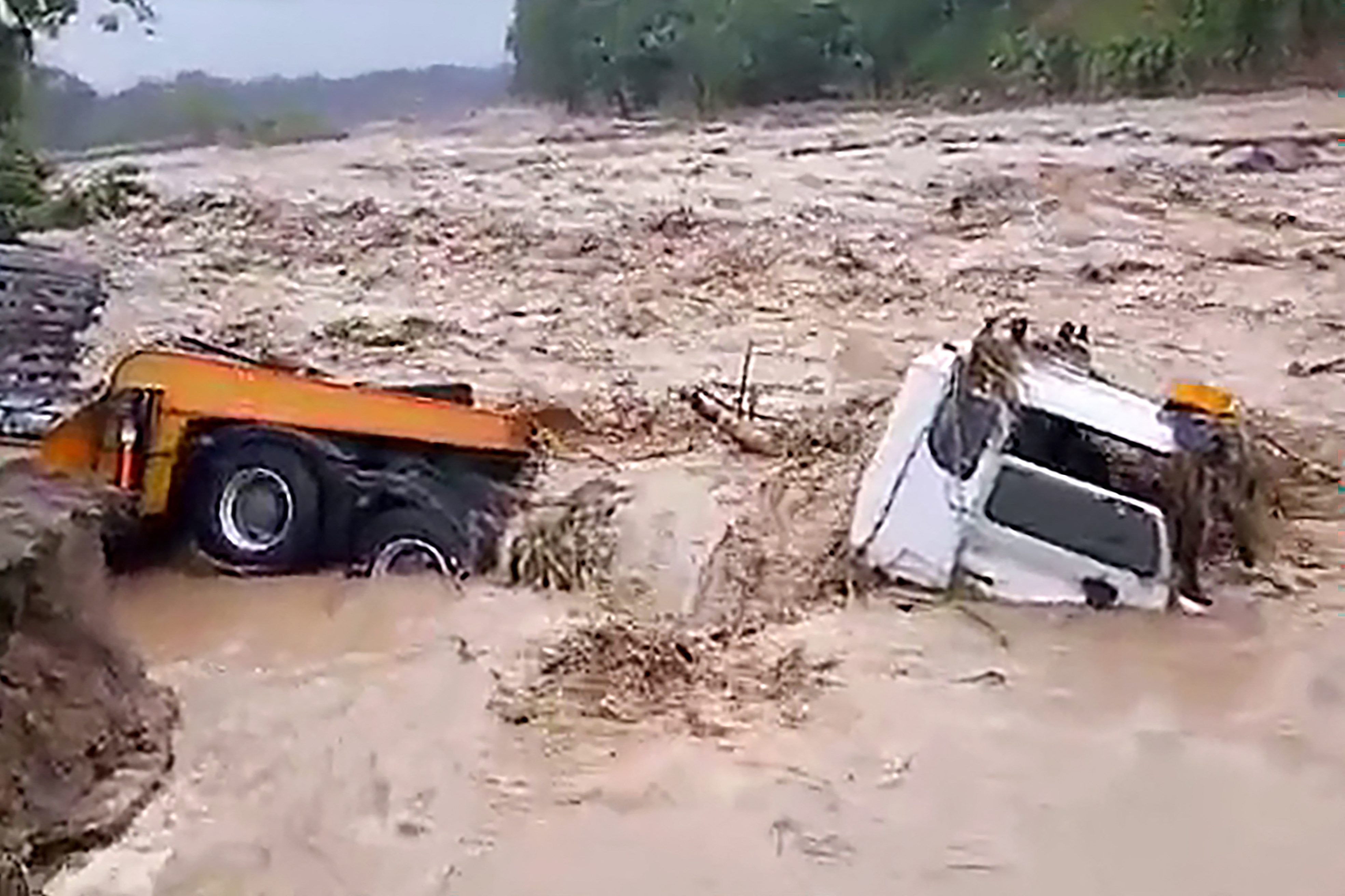 A truck damaged by floodwaters in the Ramazon River in the Tinputz district in Northern Bougainville, an autonomous region in Papua New Guinea, due to heavy rains from tropical cyclone Maila.