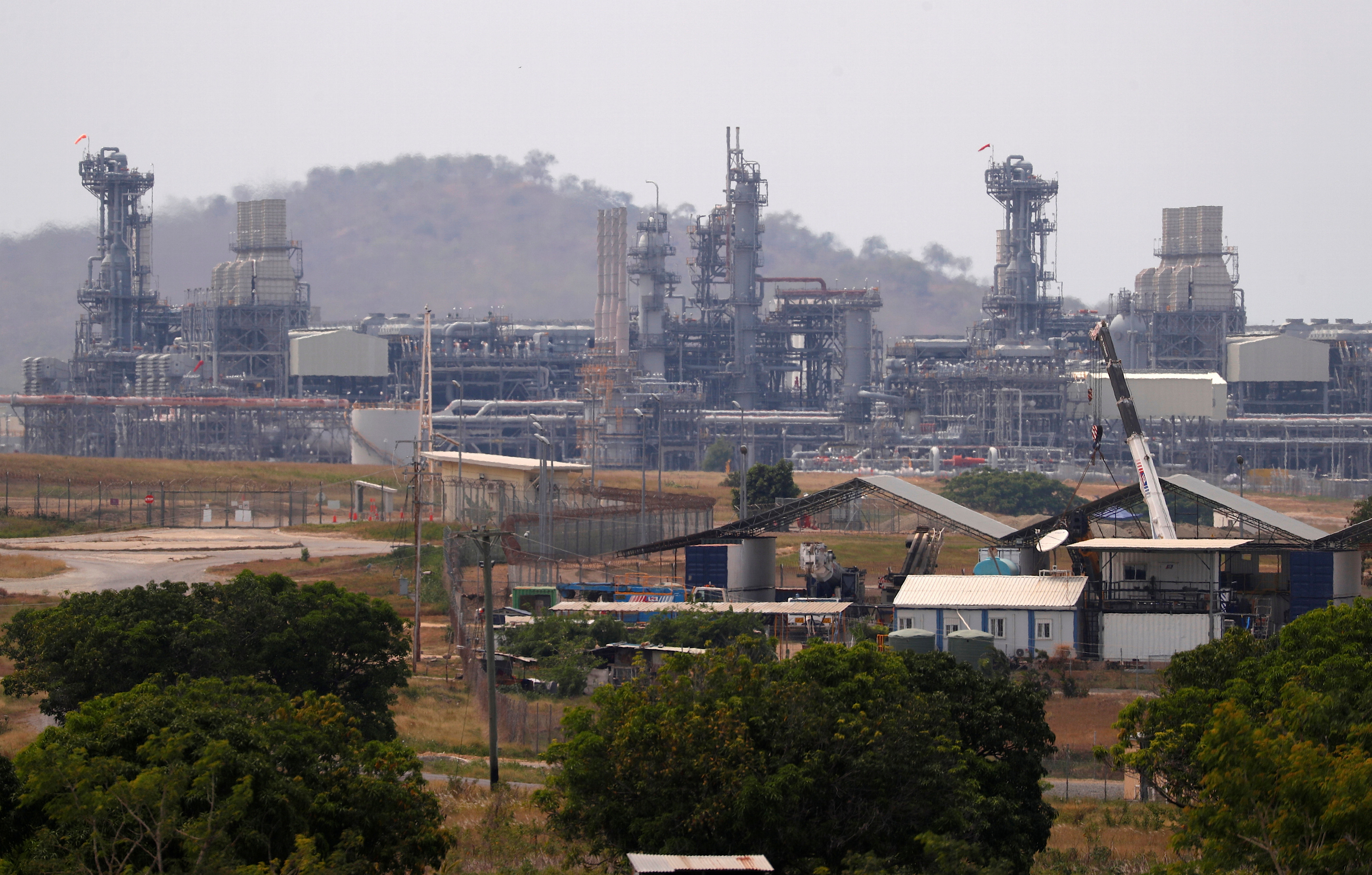 Newly constructed worker's accommodation can be seen in front of the ExxonMobil PNG Limited operated Liquefied Natural Gas (LNG) plant at Caution Bay, located on the outskirts of Port Moresby, Papua New Guinea, Nov. 19, 2018.