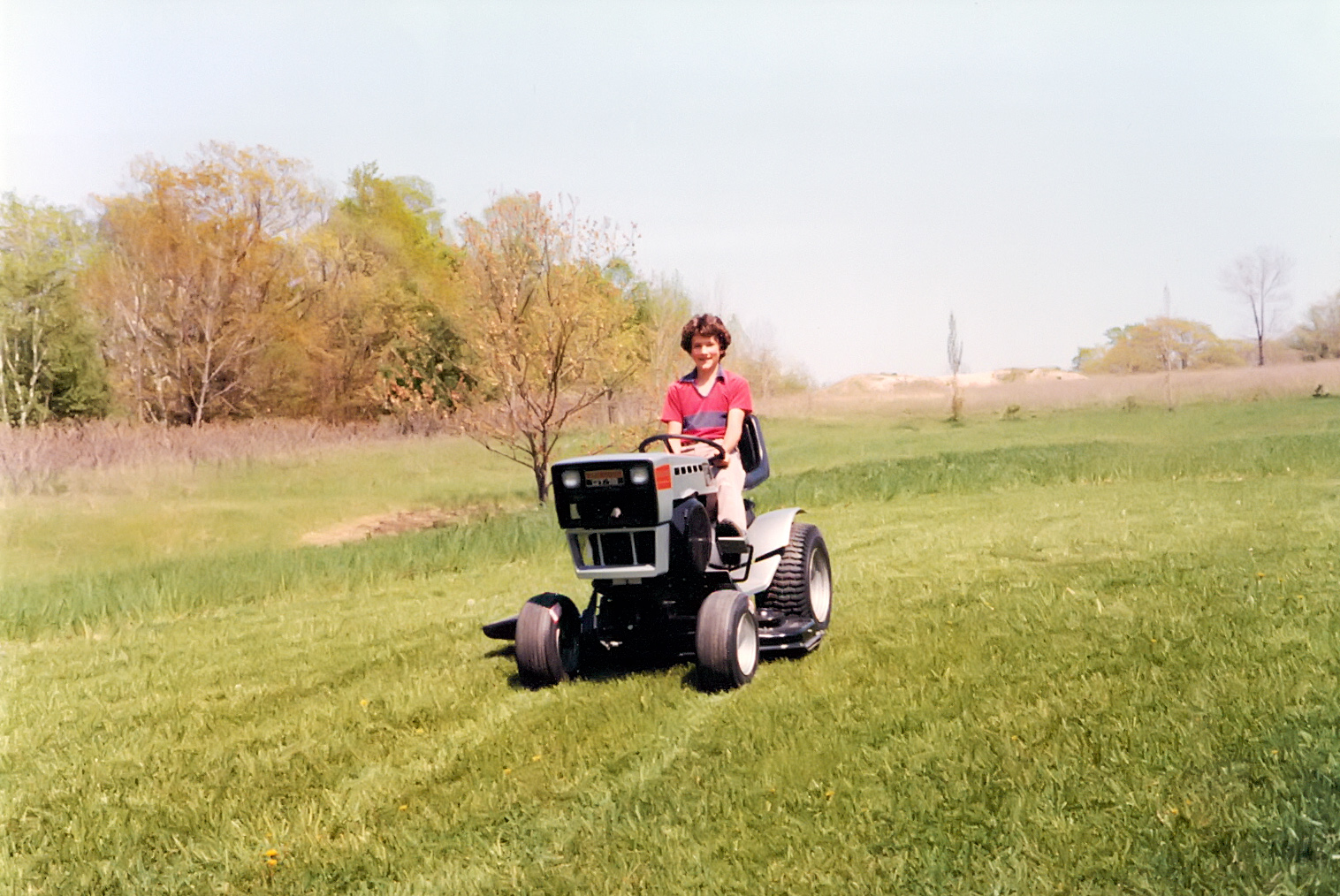 McKeel Hagerty Rides A Sears Lawnmower