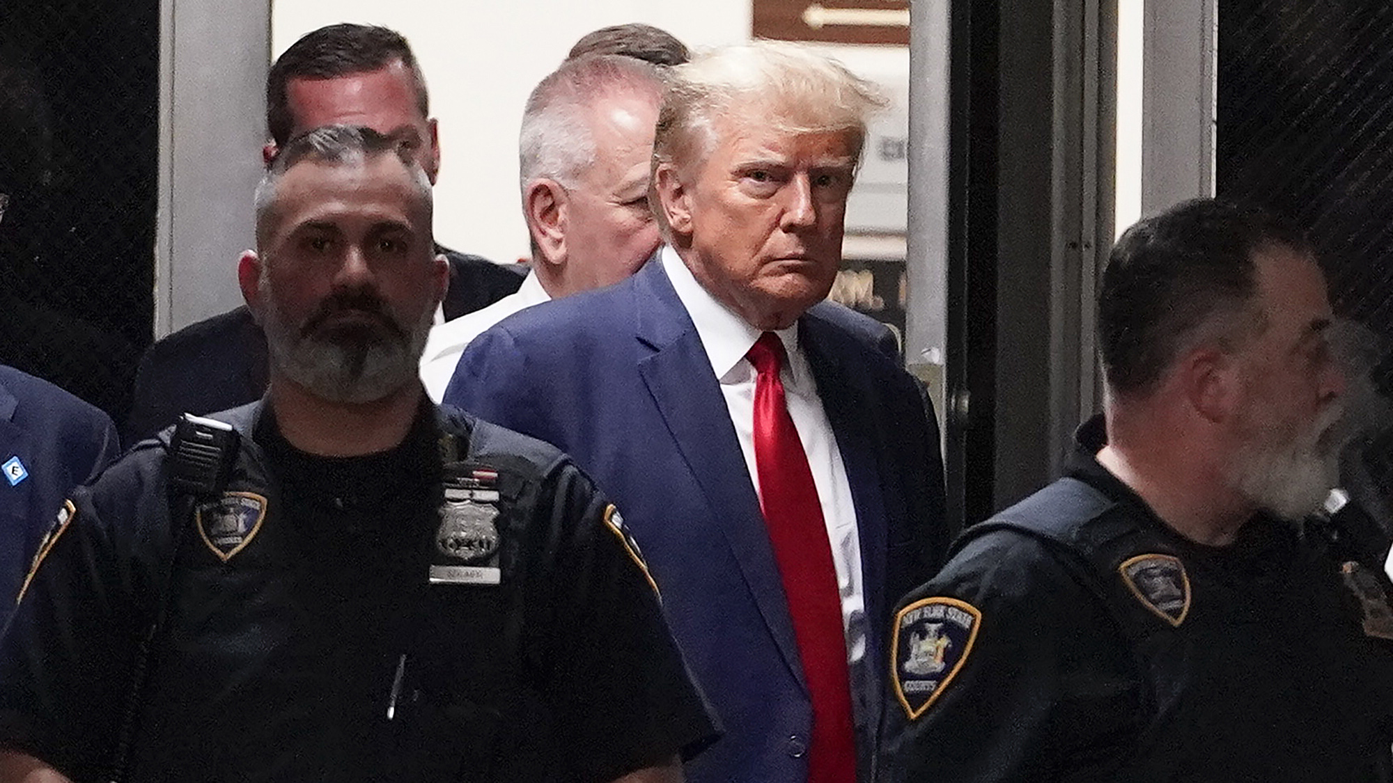 Former President Donald Trump arrives at court, Tuesday, April 4, 2023, in New York. Trump is set to appear in a New York City courtroom on charges related to falsifying business records in a hush money investigation, the first president ever to be charged with a crime. (AP Photo/Mary Altaffer)