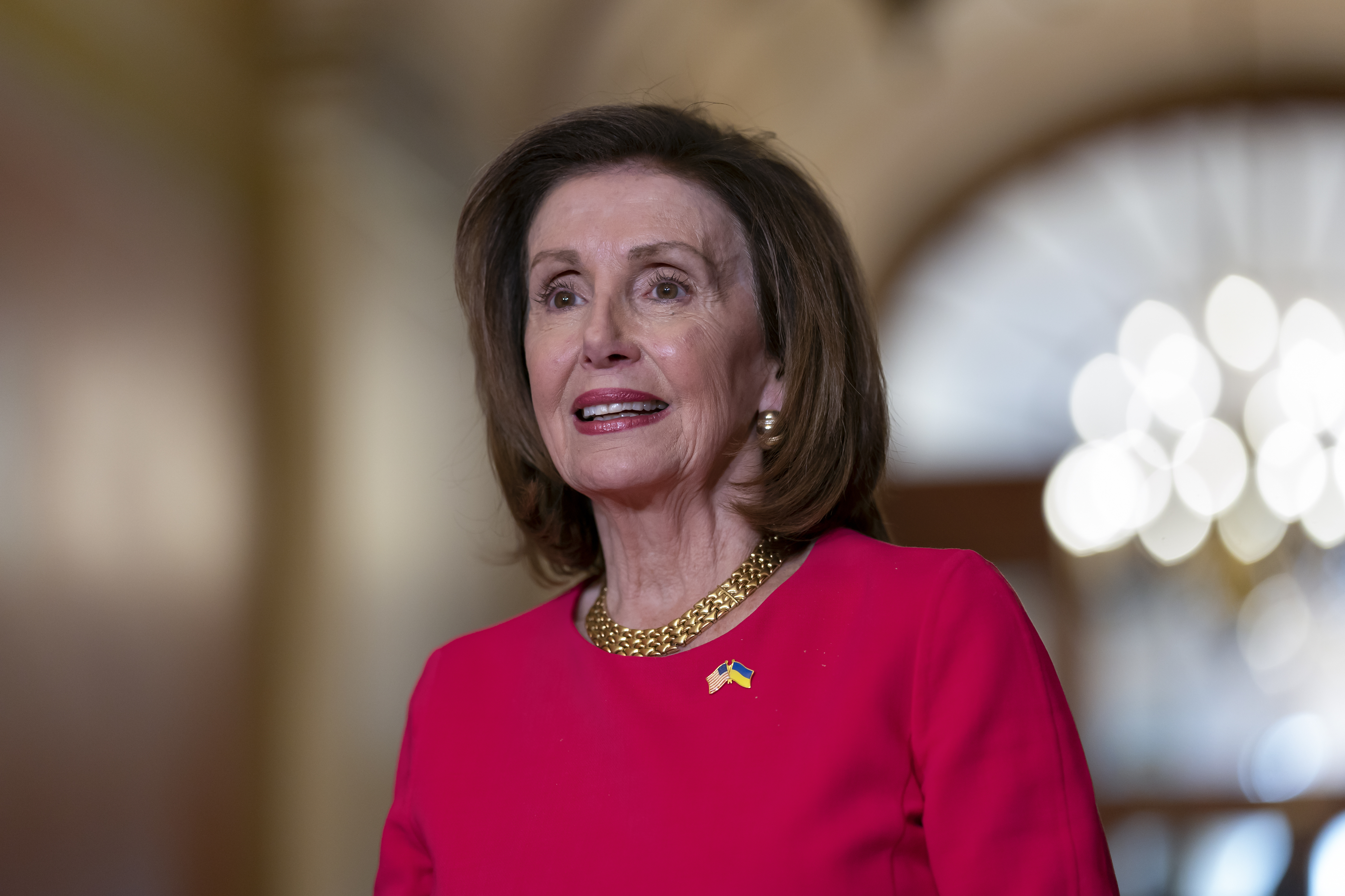 Speaker of the House Nancy Pelosi, D-Calif., stands as she welcomes Prime Minister Lee Hsien Loong of Singapore for talks at the Capitol in Washington, Wednesday, March 30, 2022. (AP Photo/J. Scott Applewhite)