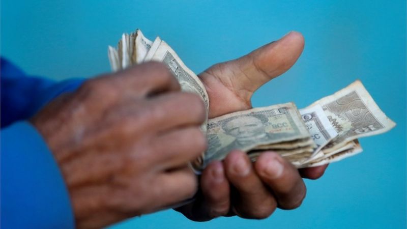 Dólar y moneda cubana