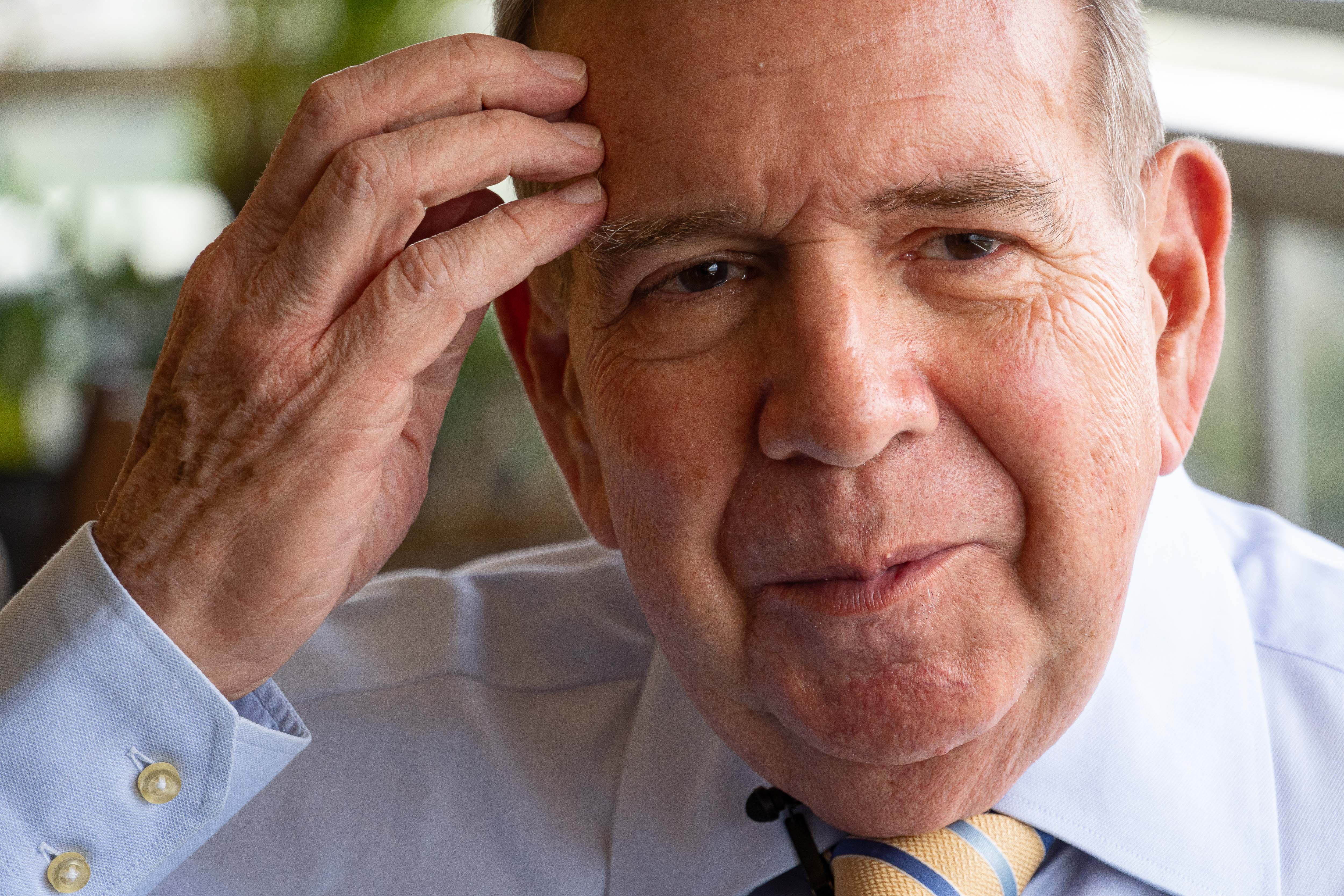Venezuelan presidential candidate Edmundo Gonzalez gestures during an interview with AFP in Caracas on April 24, 2024. Opposition parties formalized on April 23 their adhesion to the unitary candidacy of diplomat Edmundo Gonzalez Urrutia to face President Nicolas Maduro in the elections of next July 28 in Venezuela, on the verge of the deadline for the procedure, amidst complaints of obstacles. (Photo by Ronald Pe�a / AFP)