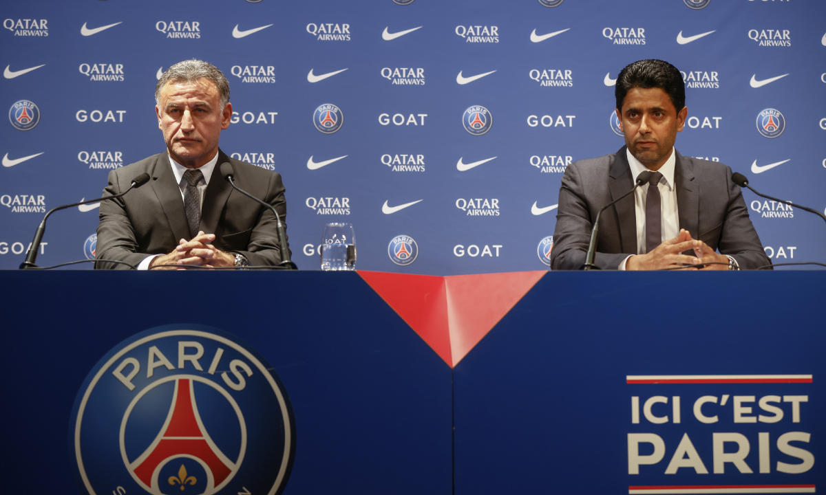 PSG president Nasser al-Khelaifi, right, and Christophe Galtier attend a press conference at the Parc des Princes stadium, Tuesday, July 5, 2022 in Paris. Christophe Galtier became Paris Saint-Germain's seventh coach in 11 years under the club's ambitious Qatari-backed ownership, with Mauricio Pochettino becoming the fourth straight coach to be fired during that time. (AP Photo/Thomas Padilla)