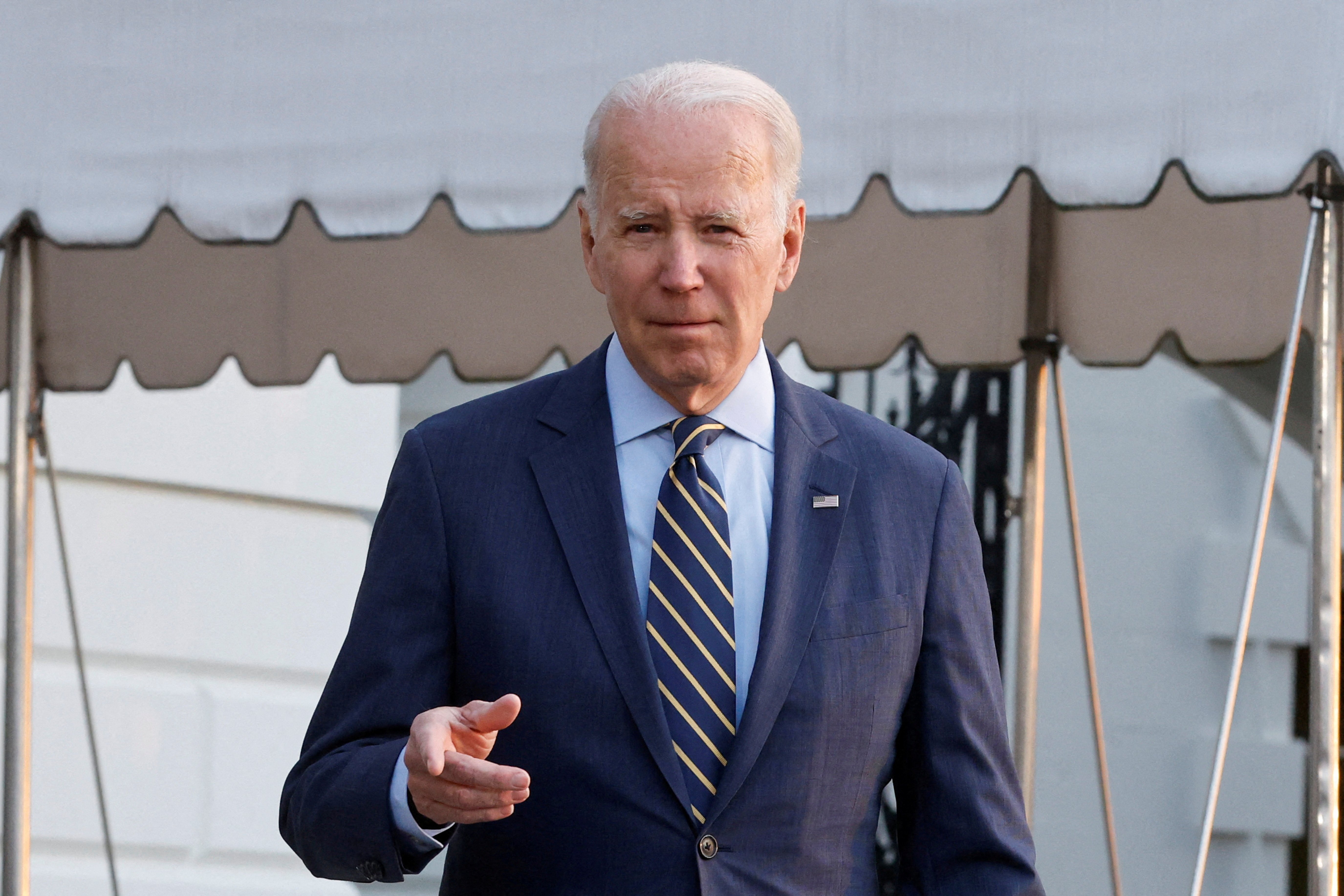 FILE PHOTO: U.S. President Joe Biden walks before boarding the Marine One helicopter, from the White House in Washington, U.S., January 11, 2023.  REUTERS/Jonathan Ernst/File Photo