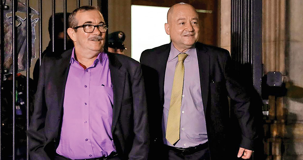 Timochenko y Carlos Lozada