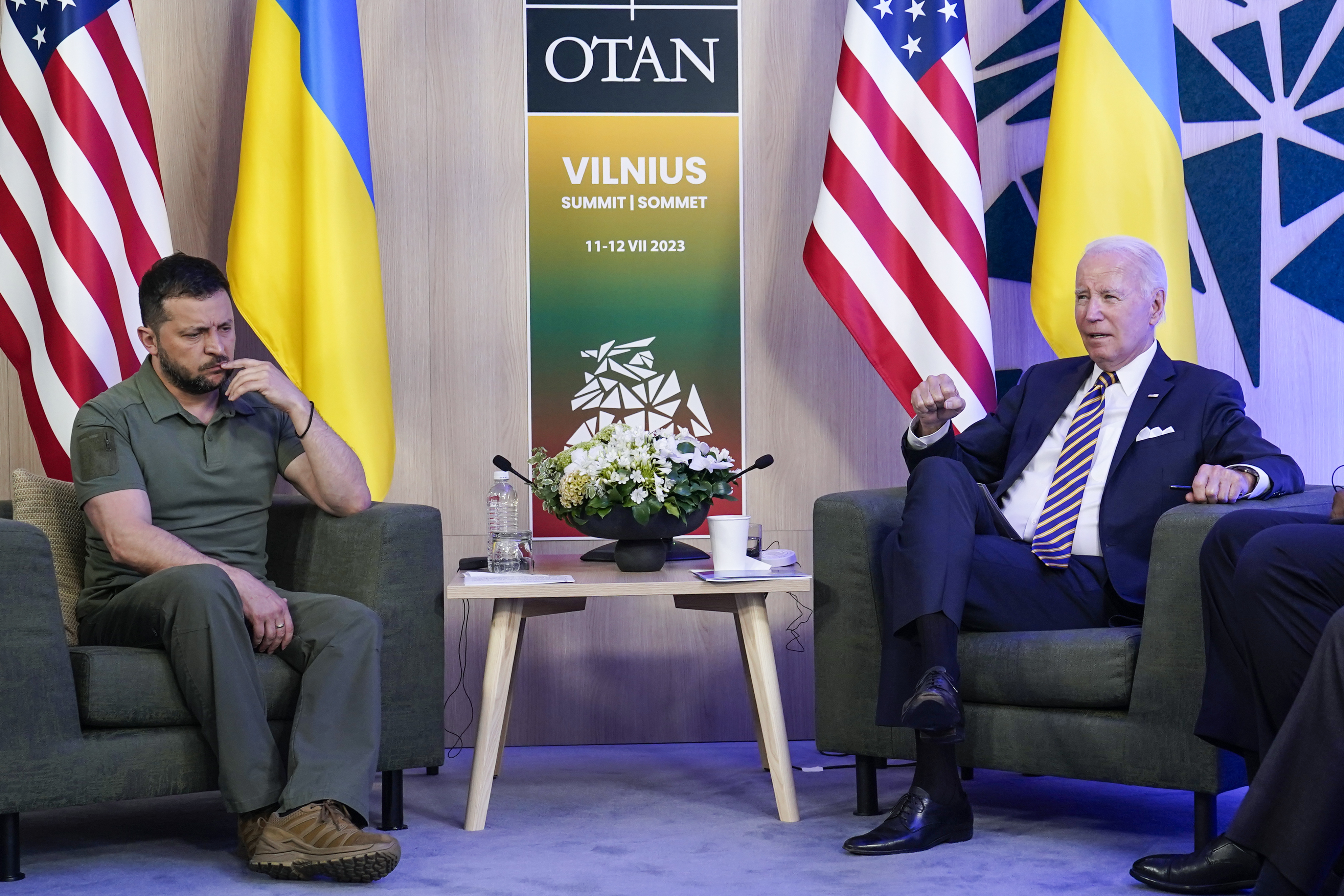 President Joe Biden, right, speaks during a meeting with Ukraine's President Volodymyr Zelenskyy, left, on the sidelines of the NATO summit in Vilnius, Lithuania, Wednesday, July 12, 2023. (AP Photo/Susan Walsh)