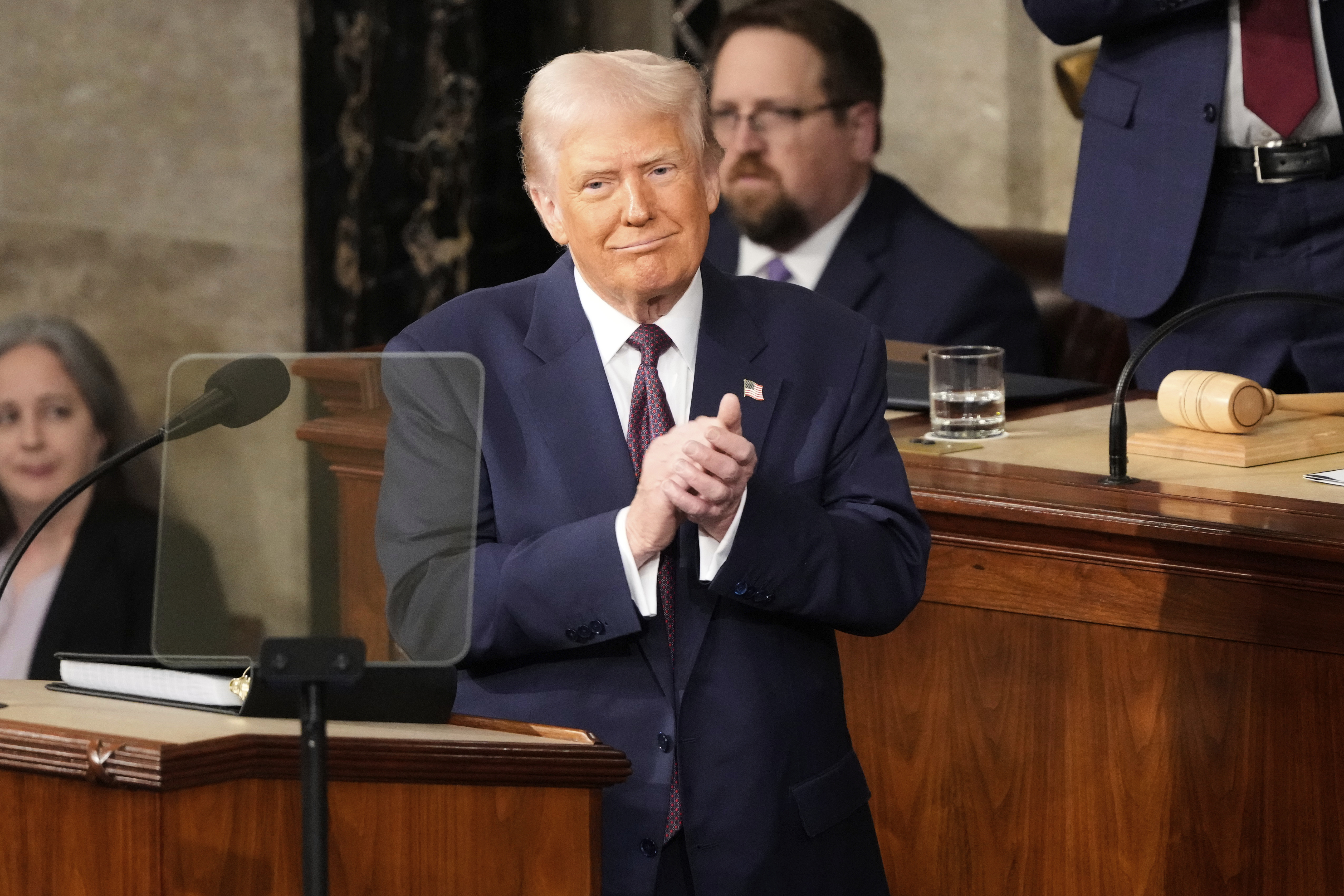 President Donald Trump claps as he addresses a joint session of Congress at the Capitol in Washington, Tuesday, March 4, 2025. (AP Photo/Ben Curtis)
