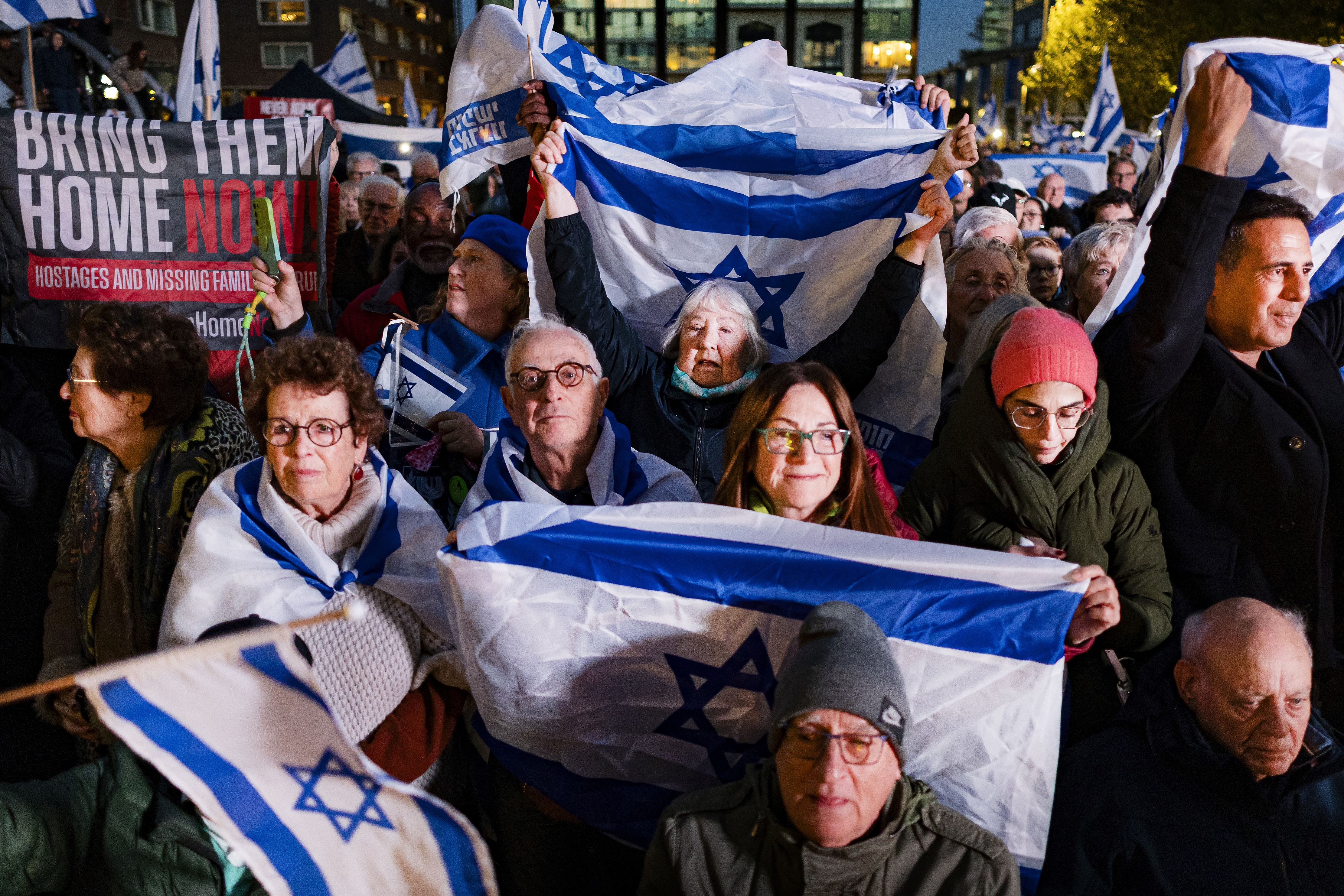 People gather  to support 'Together For Israel'  on the eve of the one year anniversary of the attack by the militant group Hamas on southern Israel,  in the center of Amstelveen on October 6, 2024. (Photo by Ramon van Flymen / ANP / AFP) / Netherlands OUT