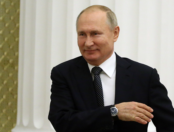 MOSCOW, RUSSIA - DECEMBER 11: (RUSSIA OUT) Russian President Vladimir Putin enters the hall during the meeting of the Podeda (Victory) Organizing Committee at Grand Kremlin Palace on December 11, 2019 in Moscow, Russia. (Photo by Mikhail Svetlov/Getty Images)