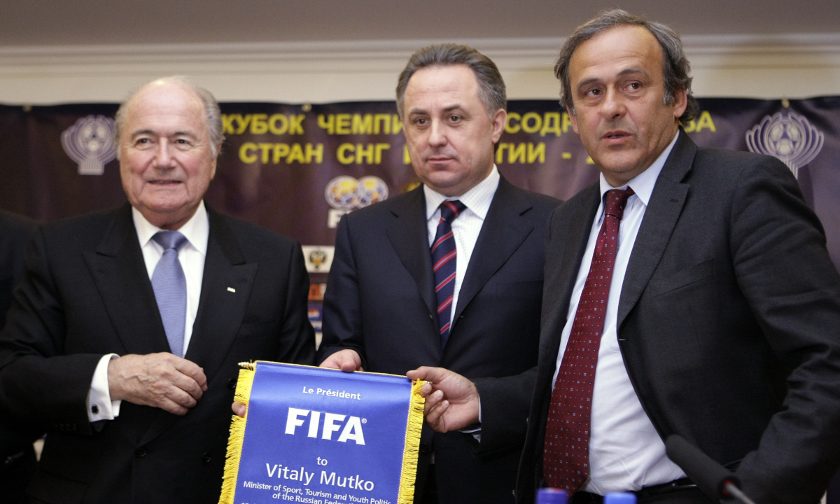 Then FIFA president Sepp Blatter, Russian Sports Minister Vitaly Mutko, who was the Russian Football Union president in 2005-2009, and then UEFA president Michel Platini are seen in Moscow. Former FIFA officials Sepp Blatter and Michel Platini will go on trial charged with fraud and other offenses in June, it was announced Tuesday, April 12, 2022. Switzerland’s federal criminal court says the trial will be heard before a panel of three judges on 11 days between June 8 and 22. (AP Photo, file)