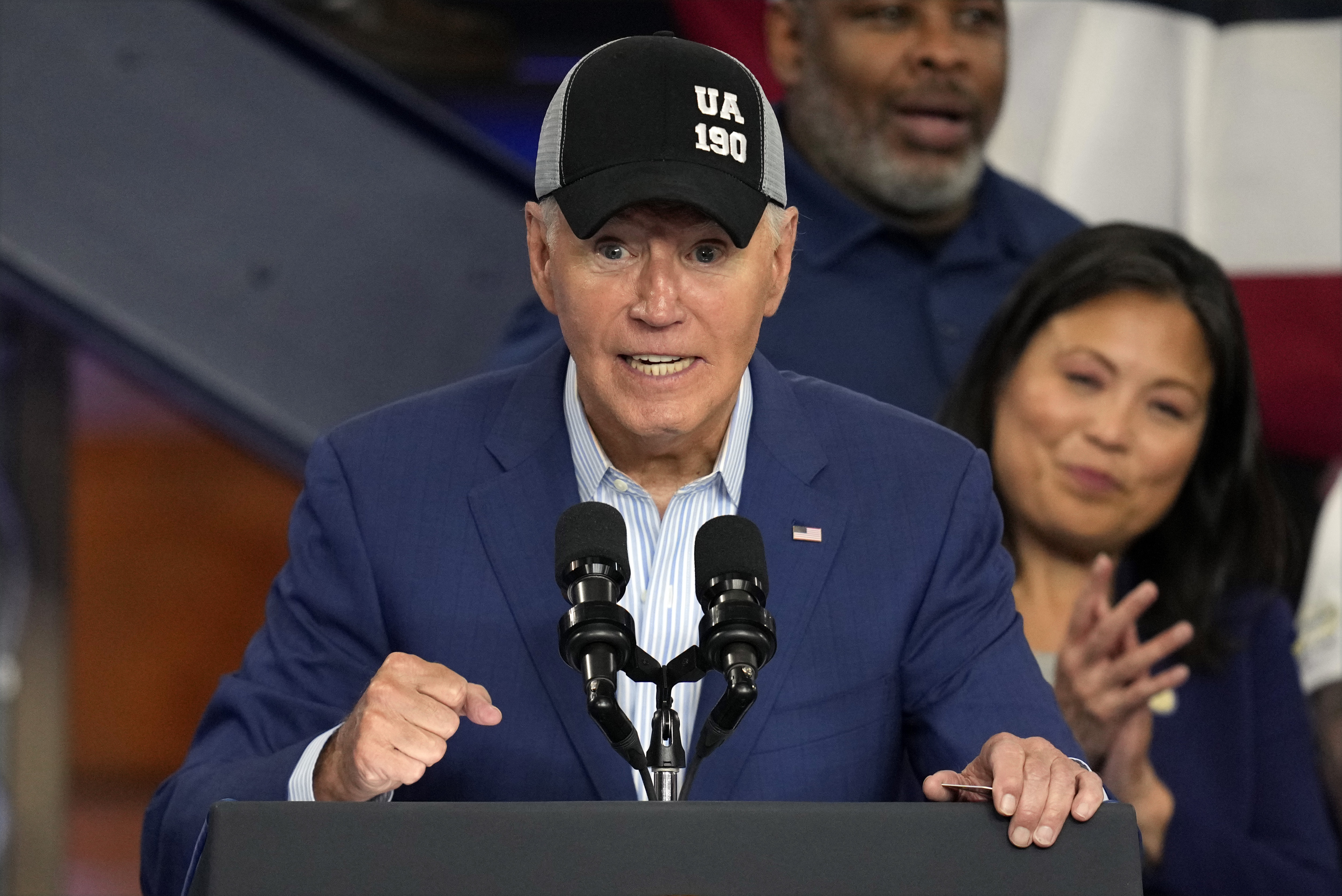 President Joe Biden wears a union hat as he speaks during a visit to the U.A. Local 190 Training Center in Ann Arbor, Mich., Friday, Sept. 6, 2024. (AP Photo/Paul Sancya)