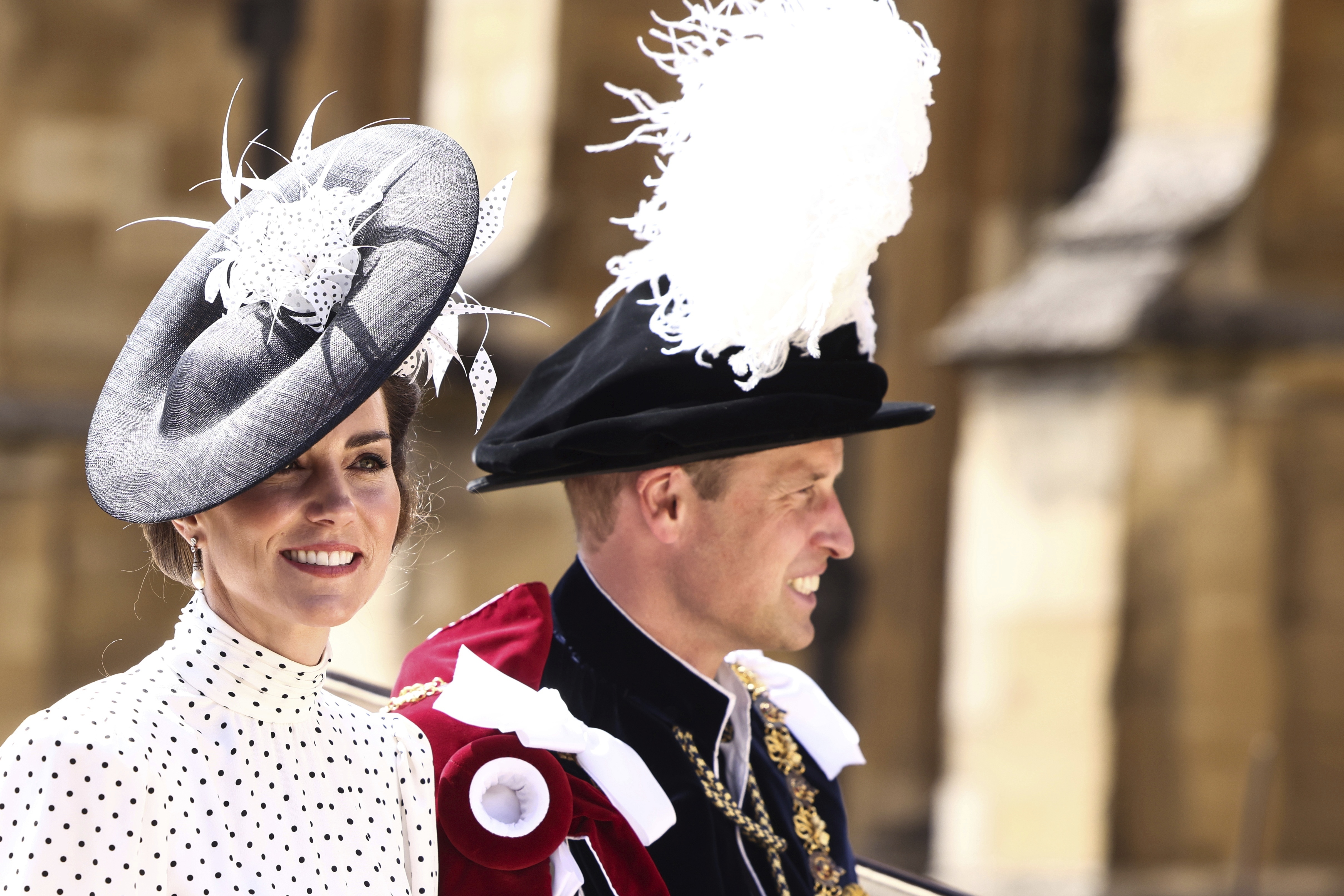 Britain's Kate, Princess of Wales and Prince William leave in a horse-drawn carriage from St George's Chapel after attending the Most Noble Order of the Garter Ceremony in Windsor Castle in Windsor, England, Monday June 19, 2023. (Henry Nicholls/Pool Photo via AP)