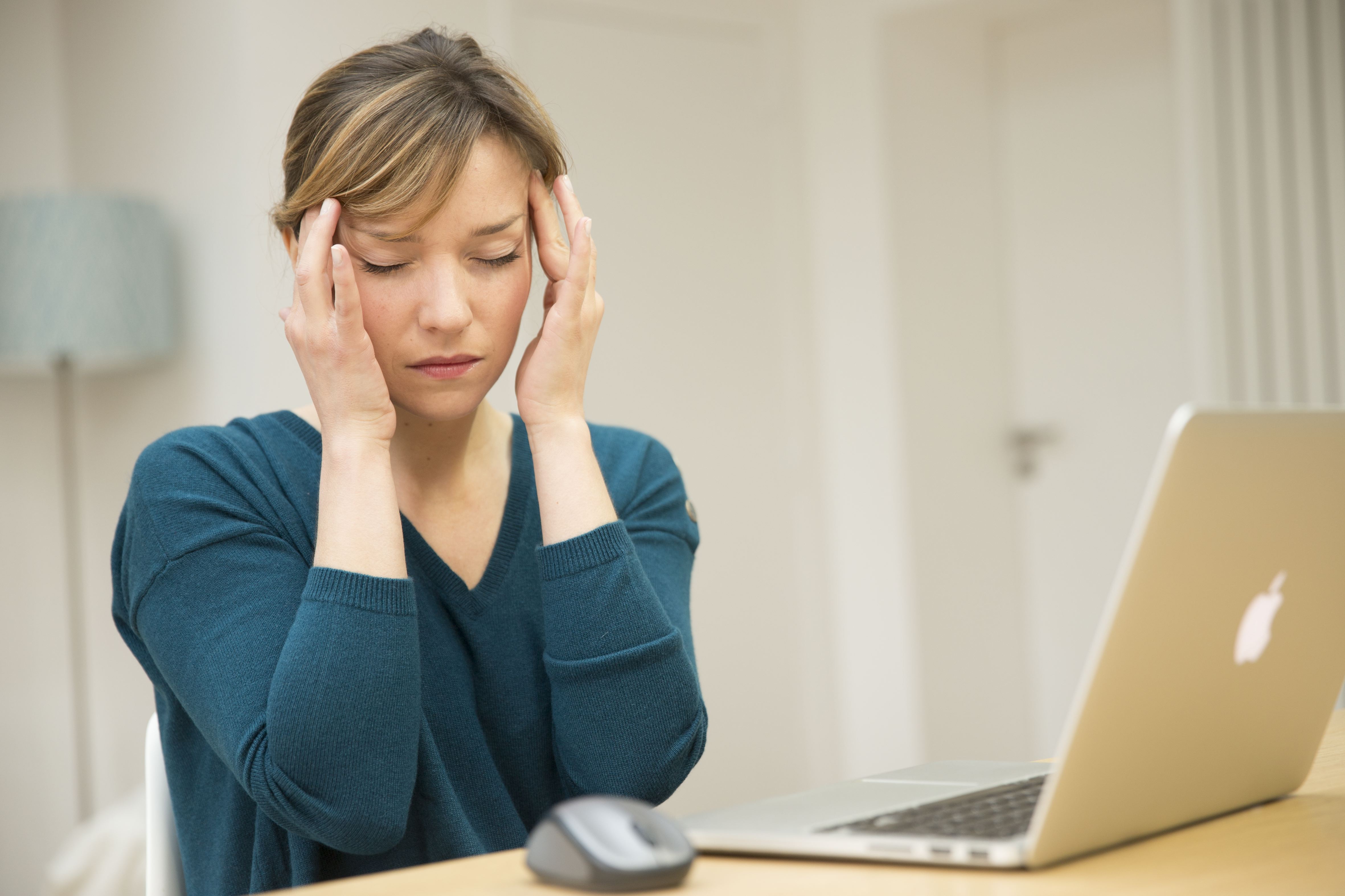 Woman suffering from headache. (Photo by: BSIP/Universal Images Group via Getty Images)
