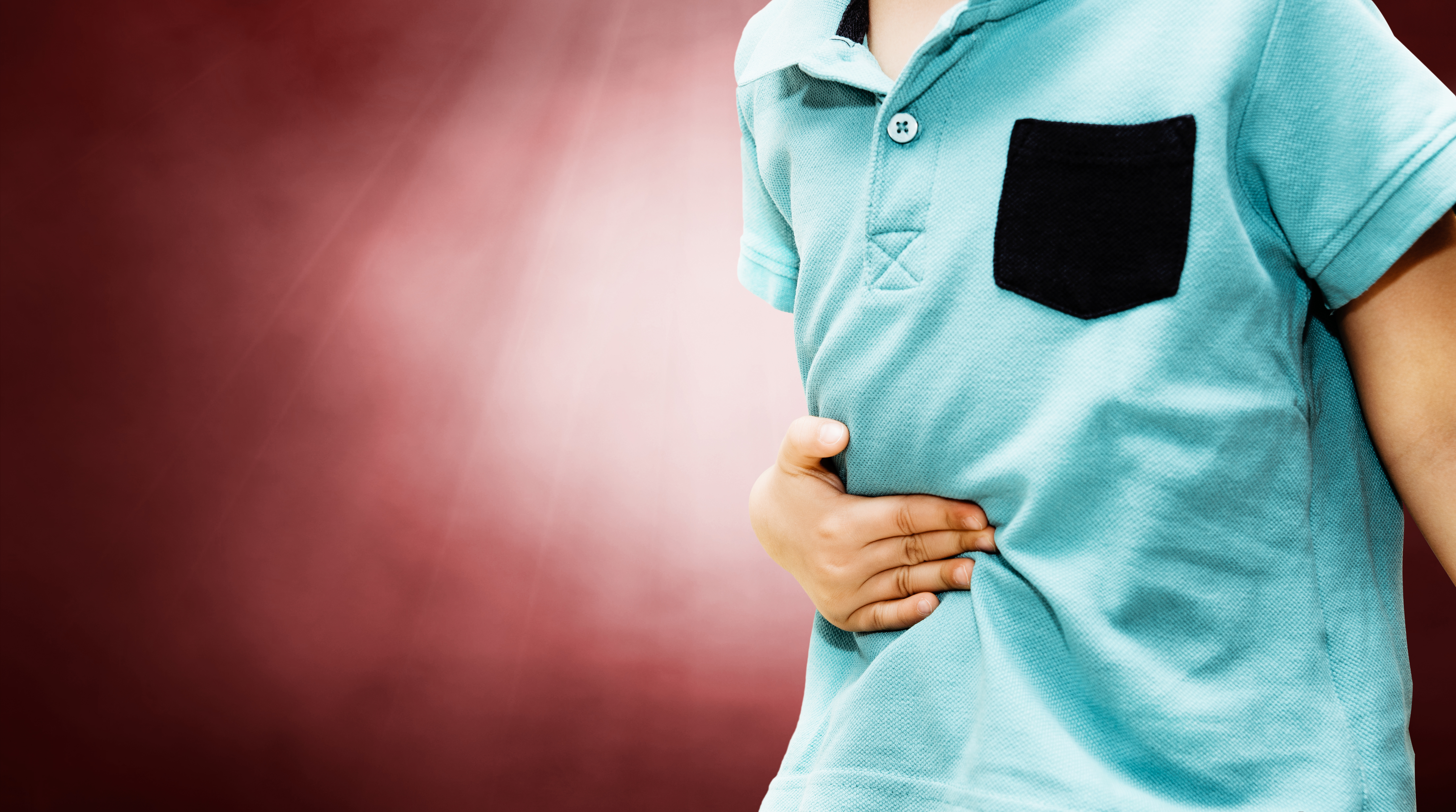 Concept of medicine and health, stomach ache. Stomach problems in children, indigestion, abdominal diseases in children.