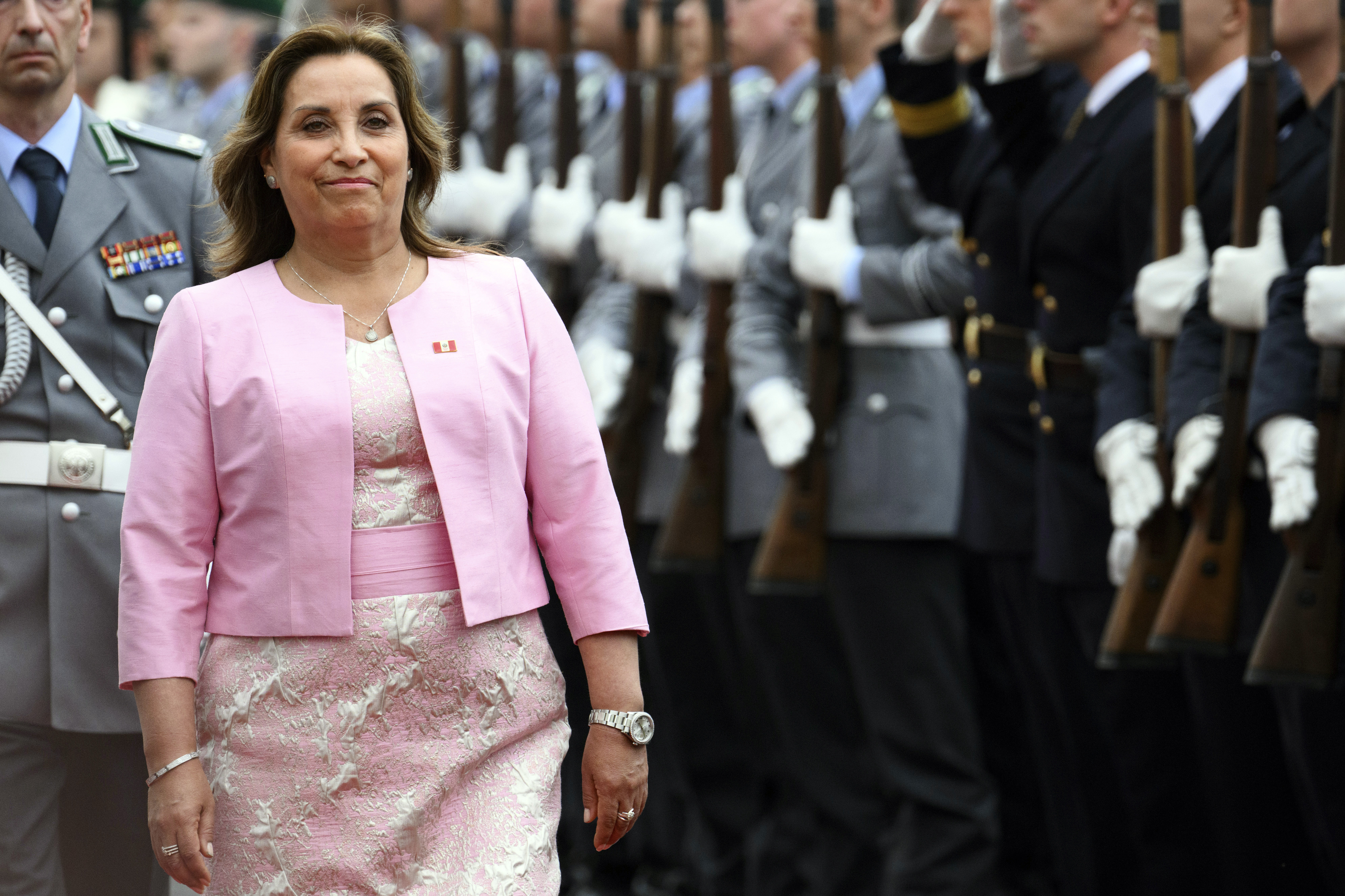 Peru's President Dina Boluarte reviews the honor guard ahead of her meeting with German President Frank-Walter Steinmeier, at Bellevue Palace, Berlin, Friday, Oct. 13, 2023. (Bernd von Jutrczenka/dpa via AP)