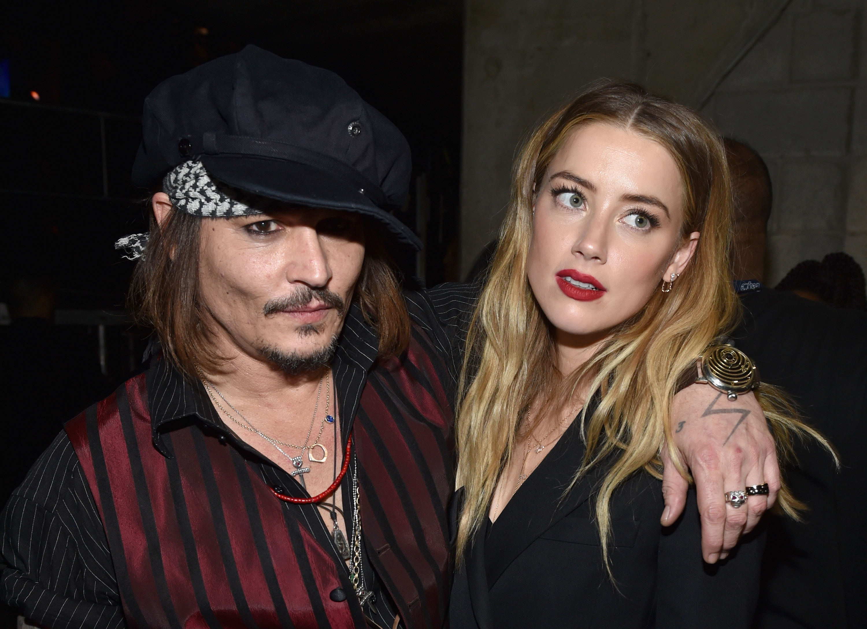 LOS ANGELES, CA - FEBRUARY 15: Actor/musician Johnny Depp (L) and actress Amber Heard attend The 58th GRAMMY Awards at Staples Center on February 15, 2016 in Los Angeles, California. (Photo by John Shearer/WireImage)