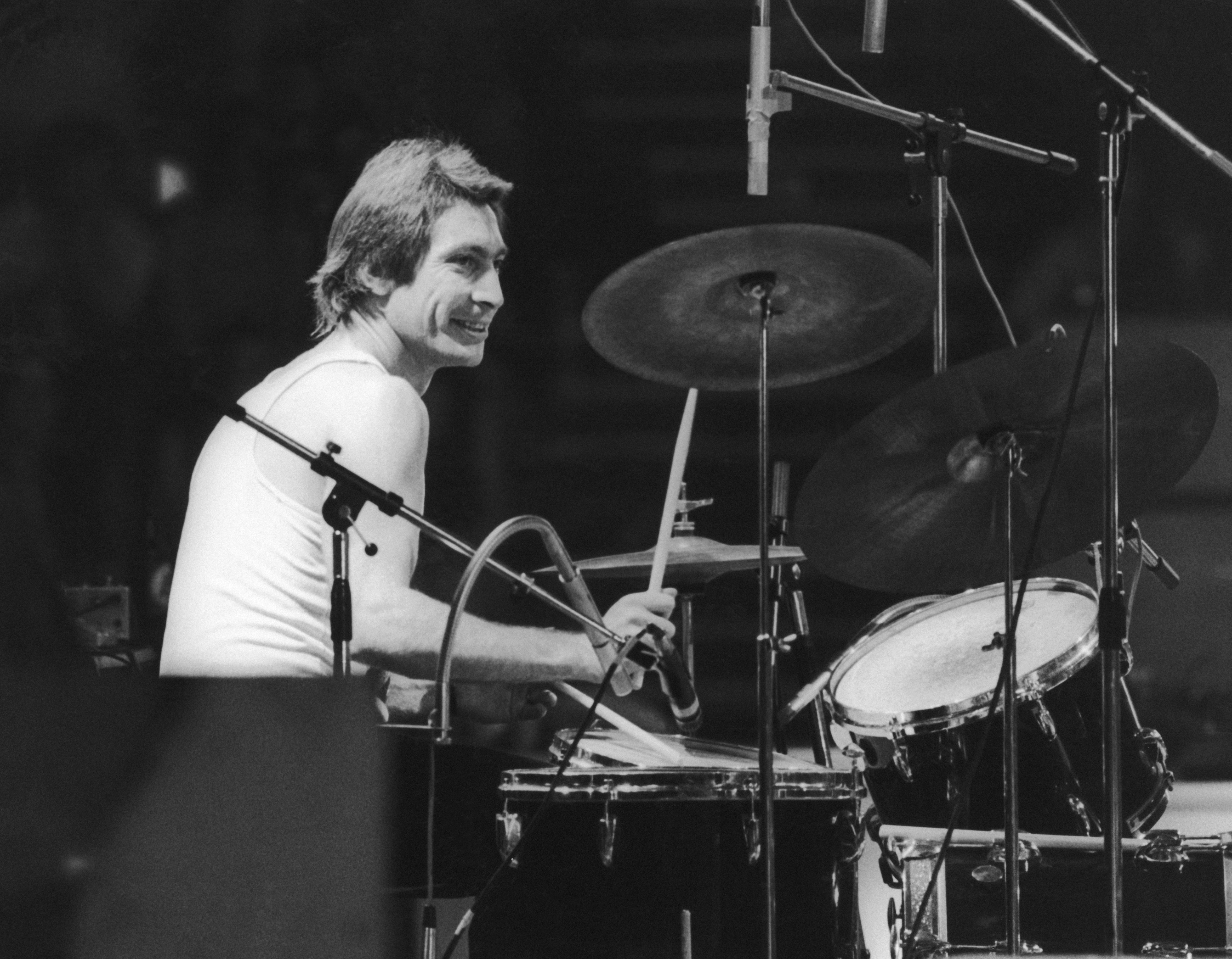Drummer Charlie Watts of the Rolling Stones, at a British concert and sporting a new David Bowie style feather cut. (Photo by Daily Express/Hulton Archive/Getty Images)  