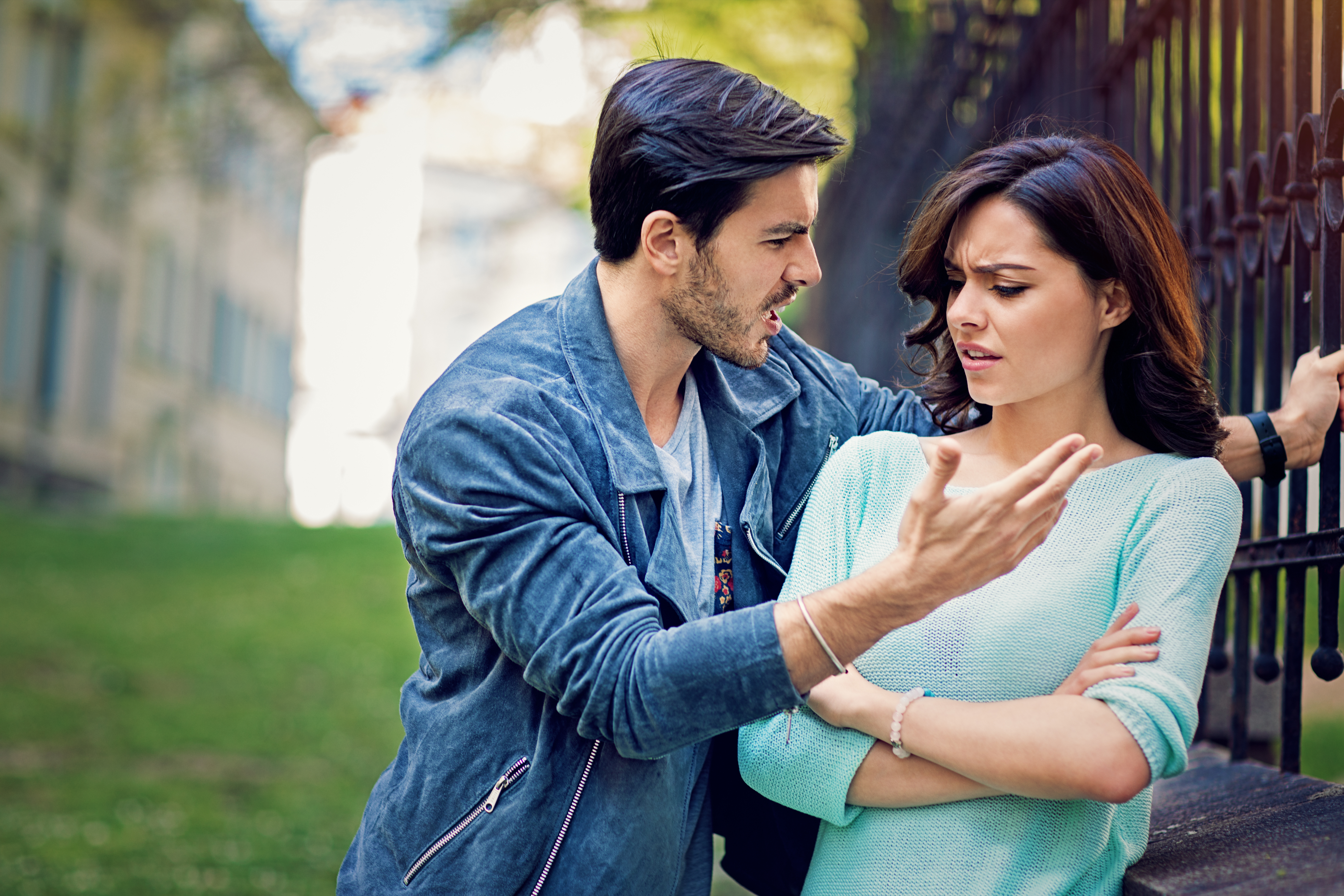 Young couple is arguing on the street