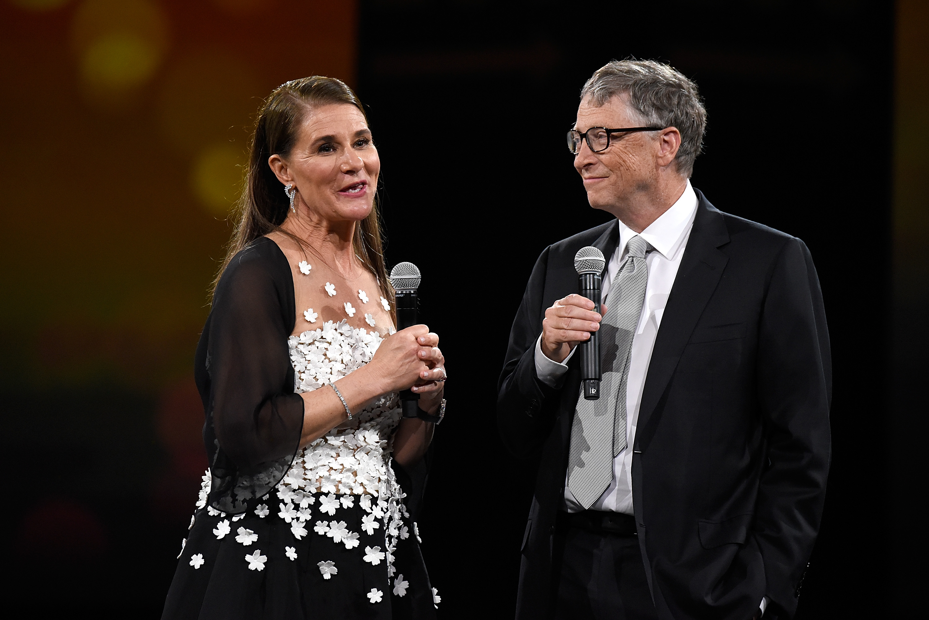NEW YORK, NY - MAY 14:  Melinda Gates and Bill Gates speak on stage during The Robin Hood Foundation's 2018 benefit at Jacob Javitz Center on May 14, 2018 in New York City.  (Photo by Kevin Mazur/Getty Images for Robin Hood)