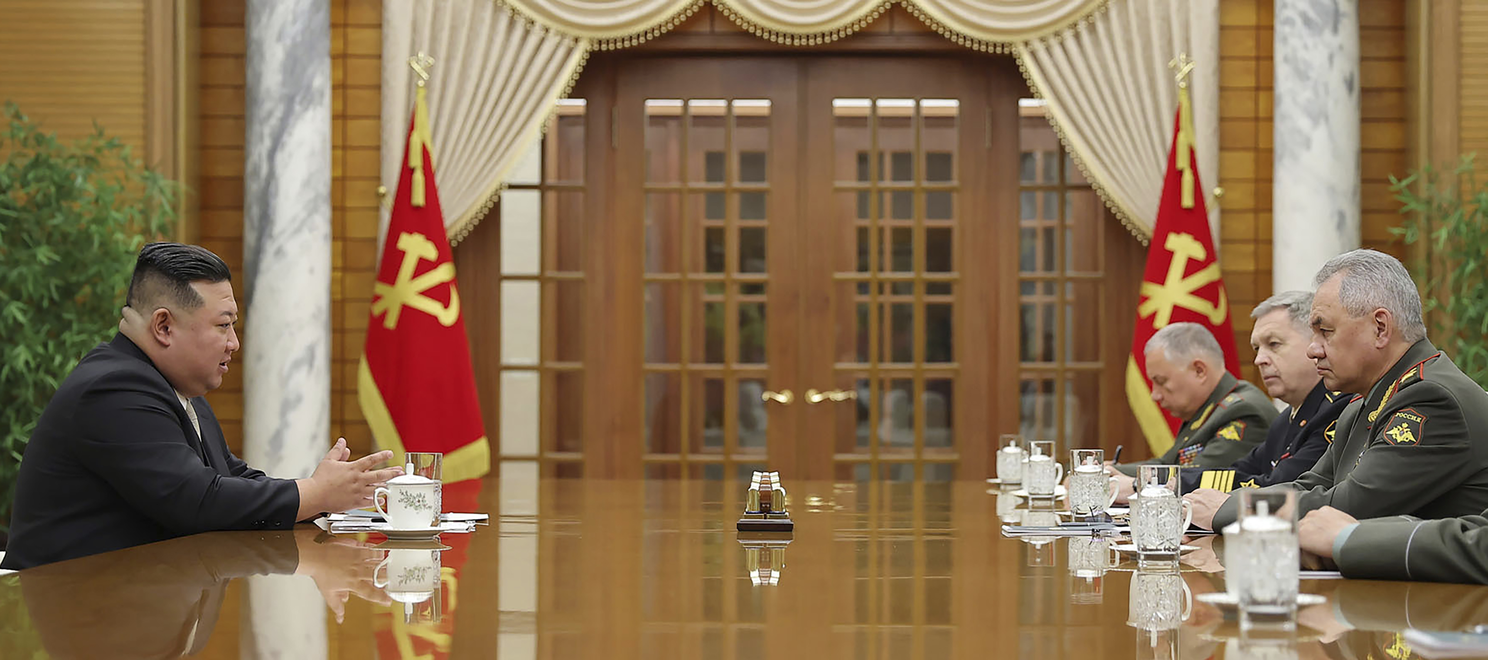 In this photo provided by the North Korean government, North Korean leader Kim Jong Un, left, meets with Russian delegates led by its Defense Minister Sergei Shoigu, right, at the headquarters of the ruling Workers’ Party’s Central Committee in Pyongyang, North Korea Wednesday, July 26, 2023, on the occasion of the 70th anniversary of the armistice that halted fighting in the 1950-53 Korean War. Independent journalists were not given access to cover the event depicted in this image distributed by the North Korean government. The content of this image is as provided and cannot be independently verified. (Korean Central News Agency/Korea News Service via AP)