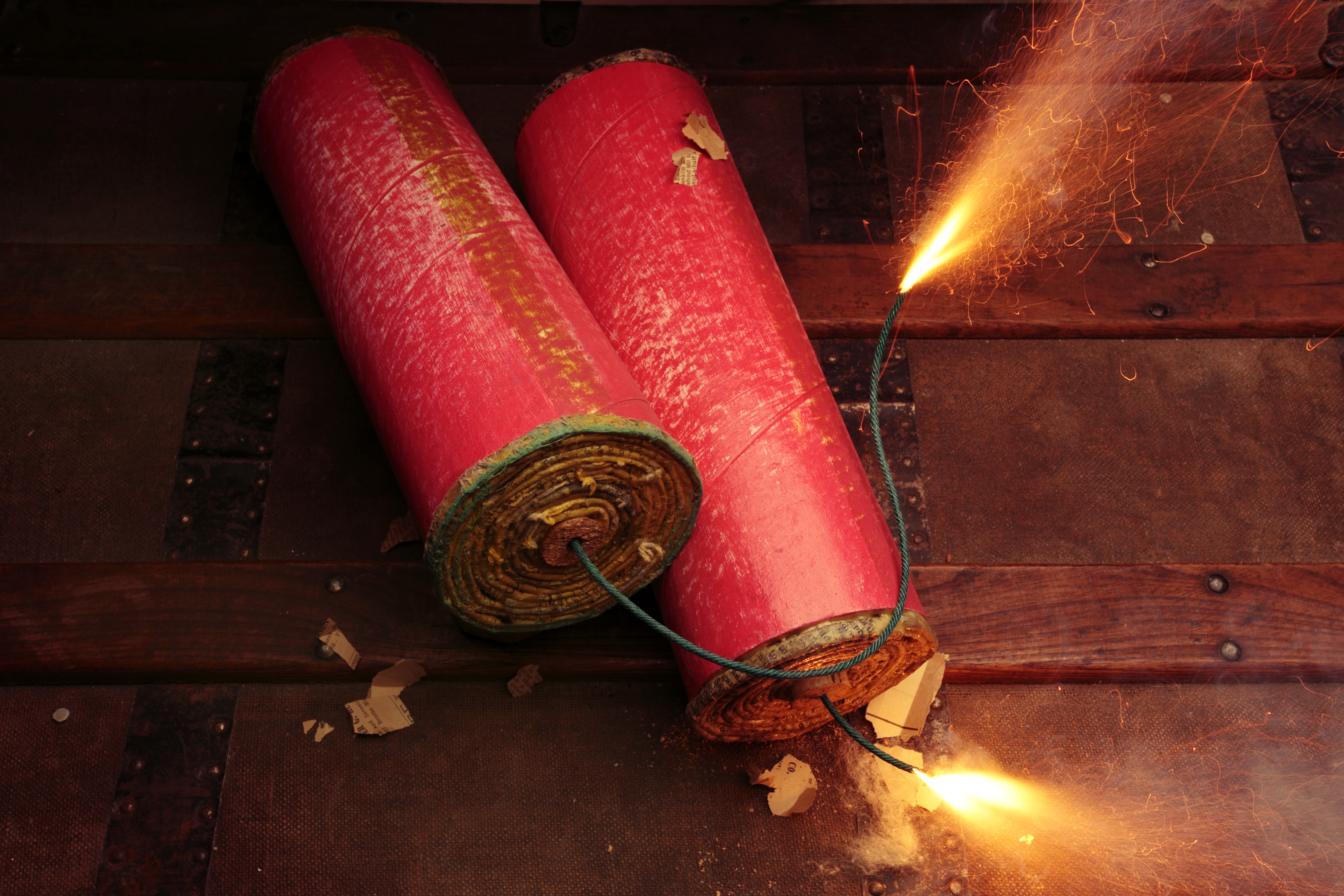 two burning firecrackers
