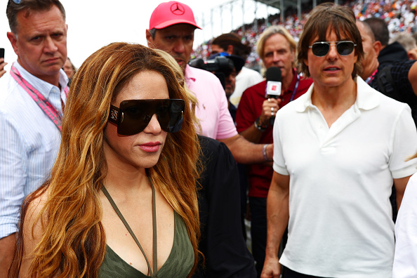 MIAMI, FLORIDA - MAY 07: Shakira and Tom Cruise walk on the grid prior to the F1 Grand Prix of Miami at Miami International Autodrome on May 07, 2023 in Miami, Florida. (Photo by Dan Istitene - Formula 1/Formula 1 via Getty Images)