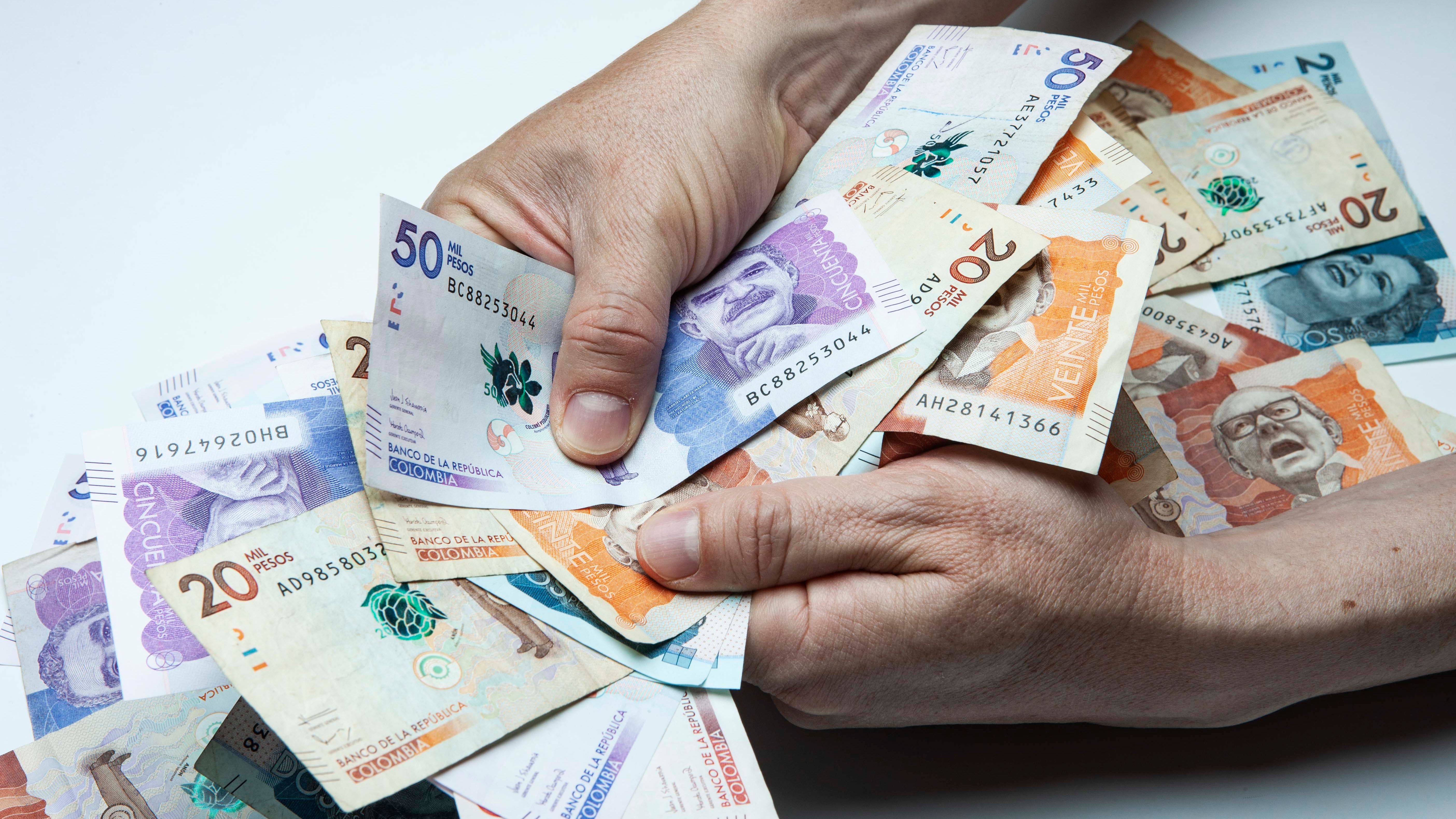 Billetes de cincuenta y veinte mil pesos
Bogotá, octubre 14 de 2020
Foto: Nathalia Garzón - Revista Dinero