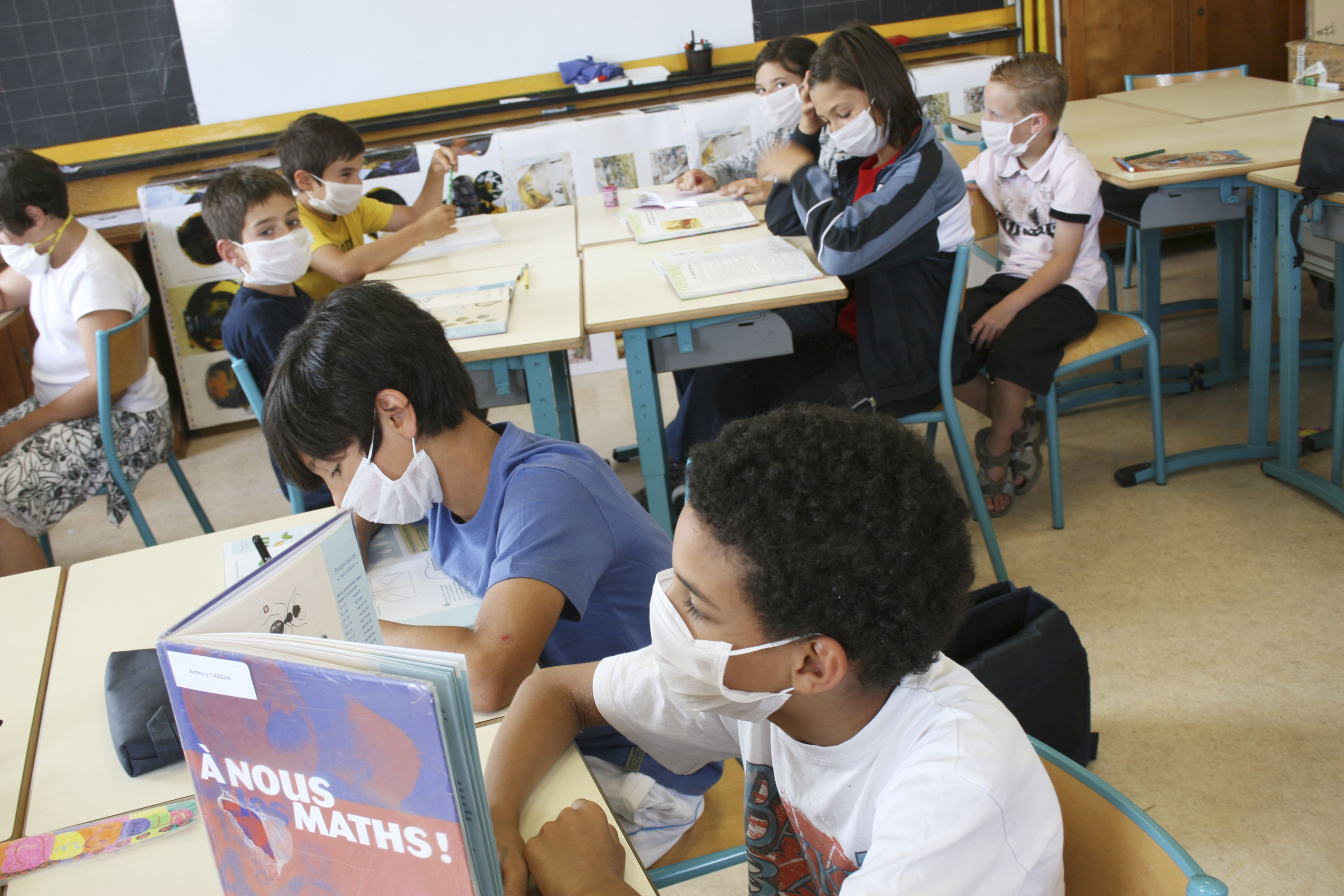 Prevention, mask, Simulation for influenza A prevention in a primary school. (Photo by: BSIP/Universal Images Group via Getty Images)