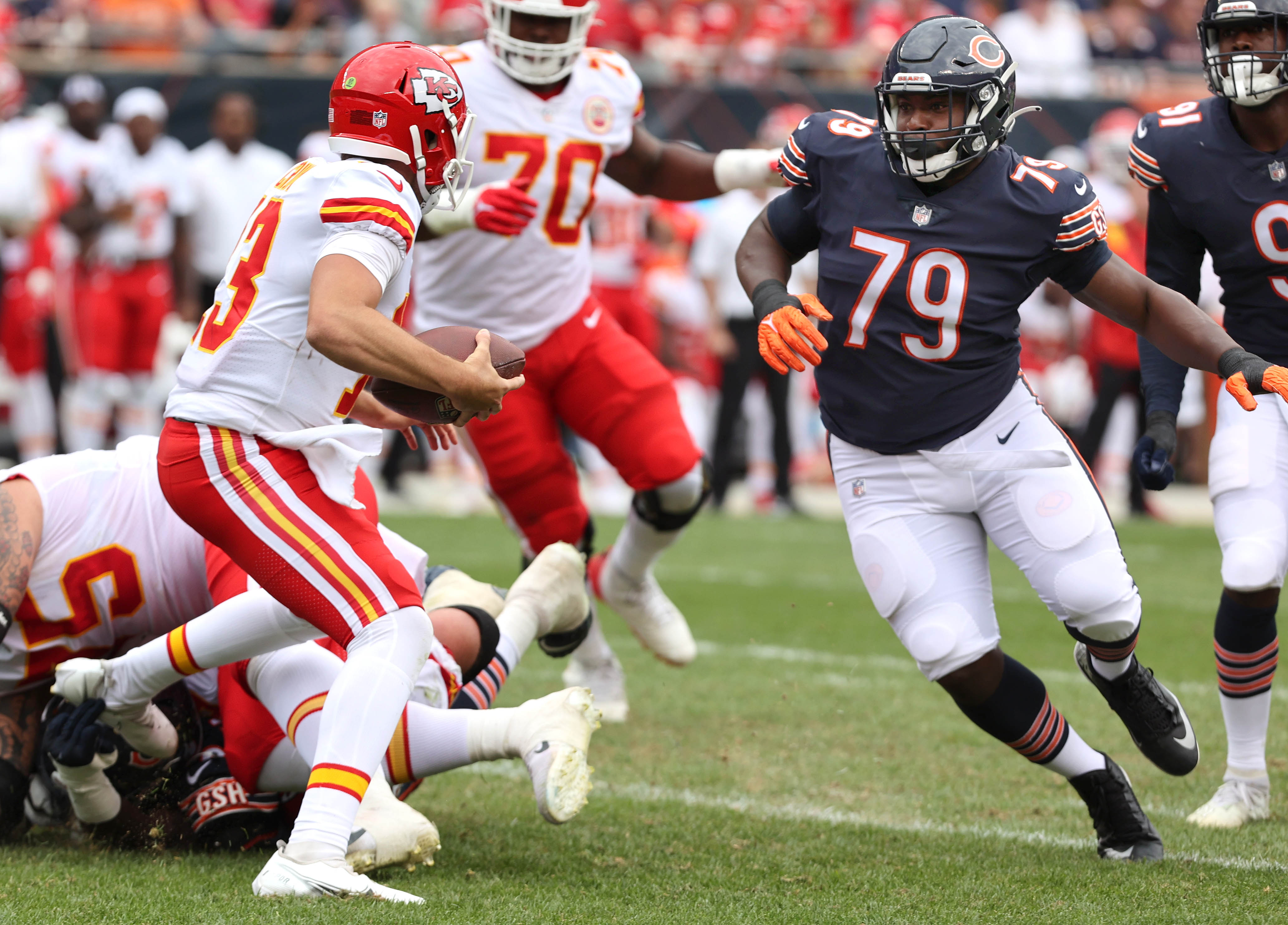 Chicago Bears defensive tackle Trevon Coley (79) runs off the field after  an NFL football game