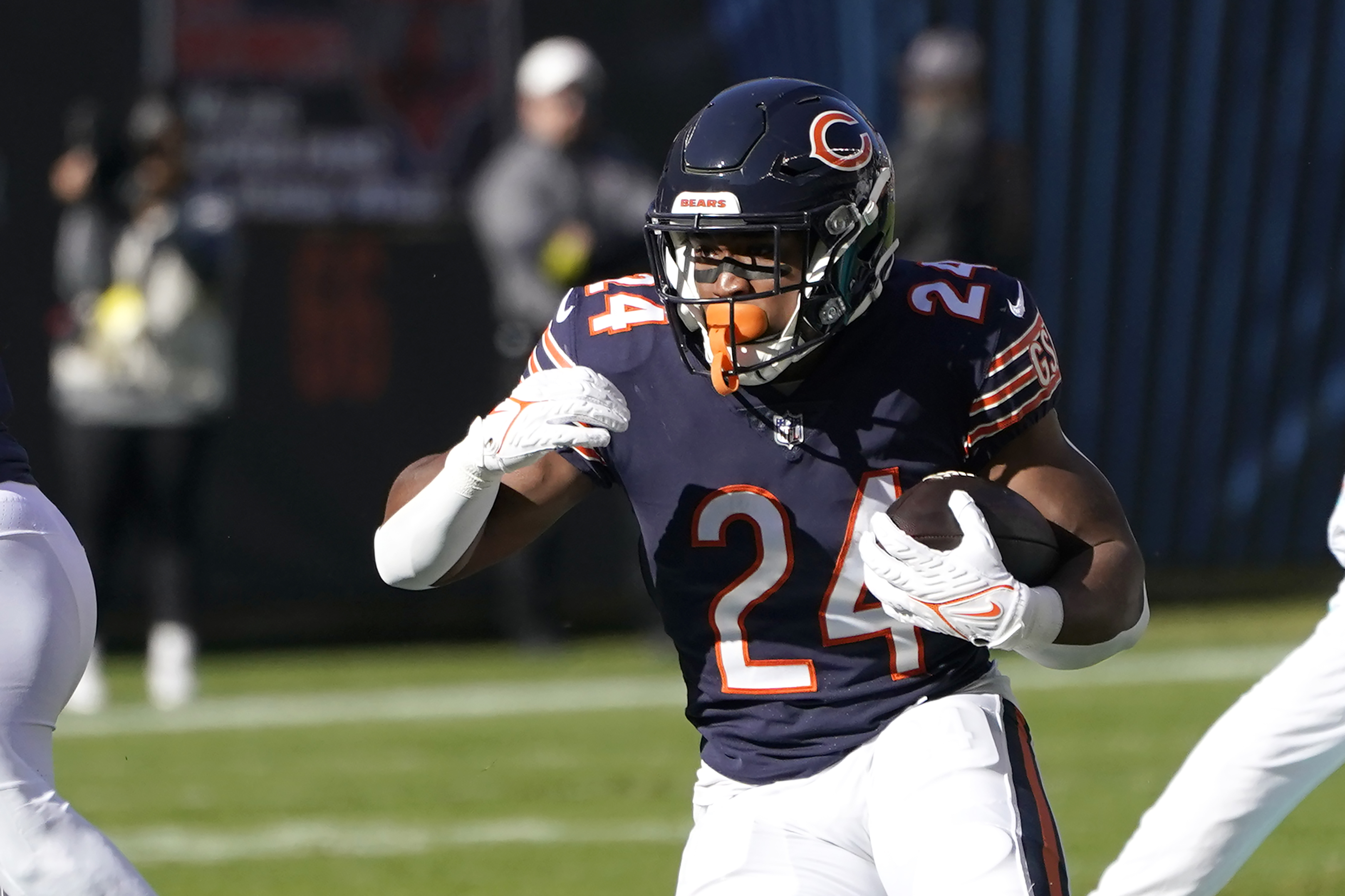 Chicago Bears running back Khalil Herbert (24) warms up prior to