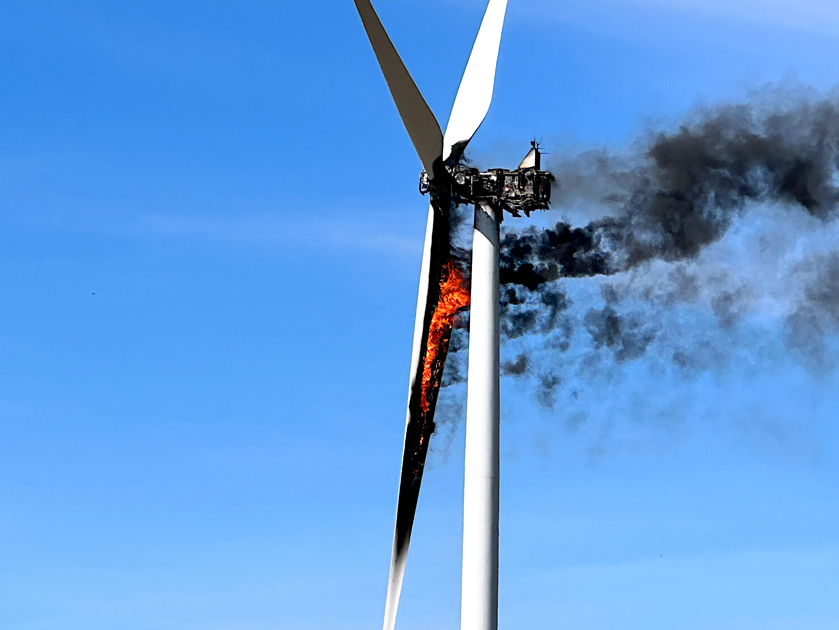 Windfall Fire Wind Turbine Fire Jump Men