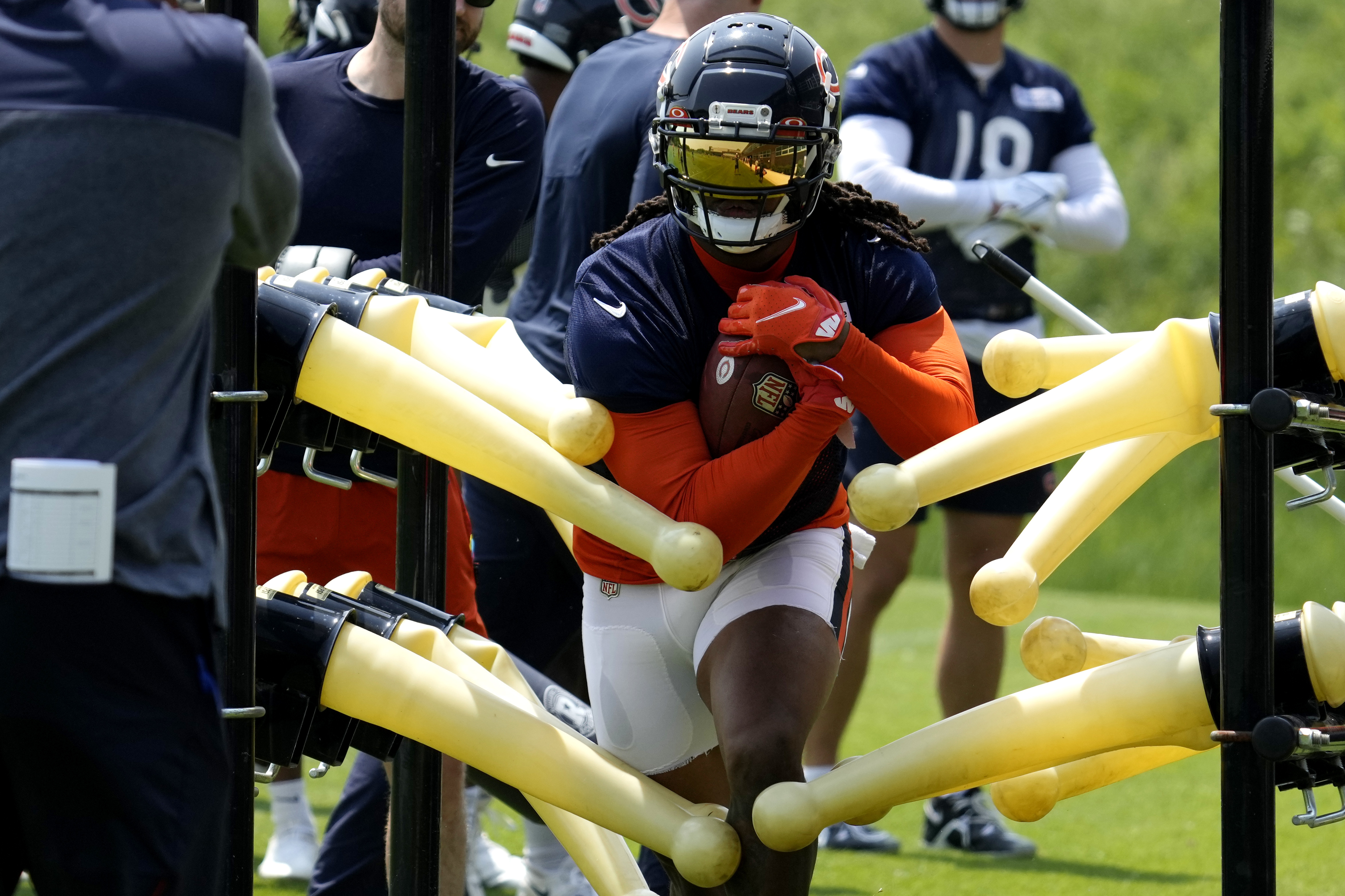 Chicago Bears new player wide receiver DJ Moore smiles as he listens to a  question from the media during an NFL football news conference at Halas  Hall in Lake Forest, Ill., Thursday