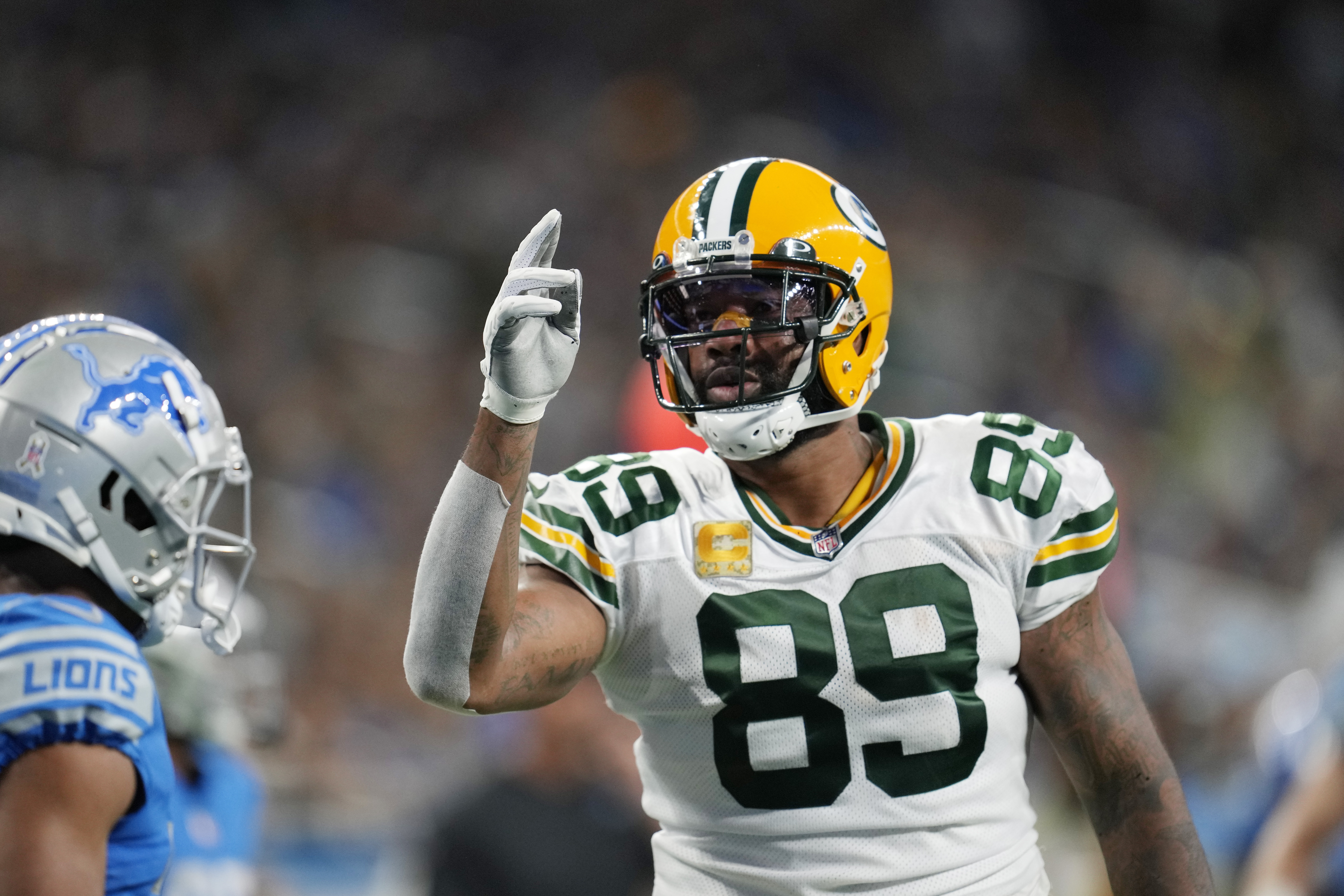 Green Bay Packers tight end Marcedes Lewis (89) is tackled by