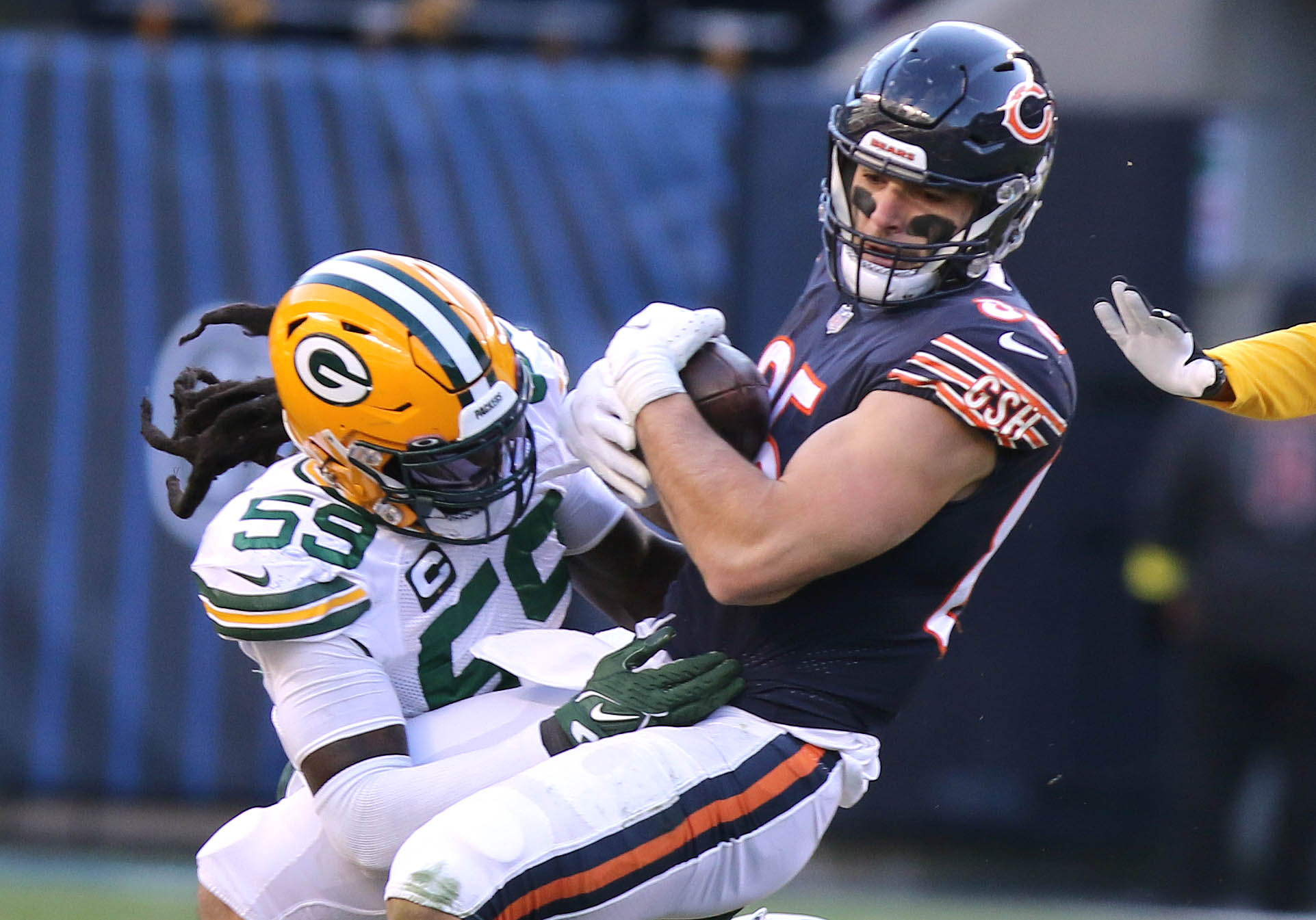 Chicago Bears wide receiver Chase Claypool (10) is tackled by Green Bay  Packers cornerback Rasul Douglas (29) during the first half of an NFL  football game, Sunday, Dec. 4, 2022, in Chicago. (