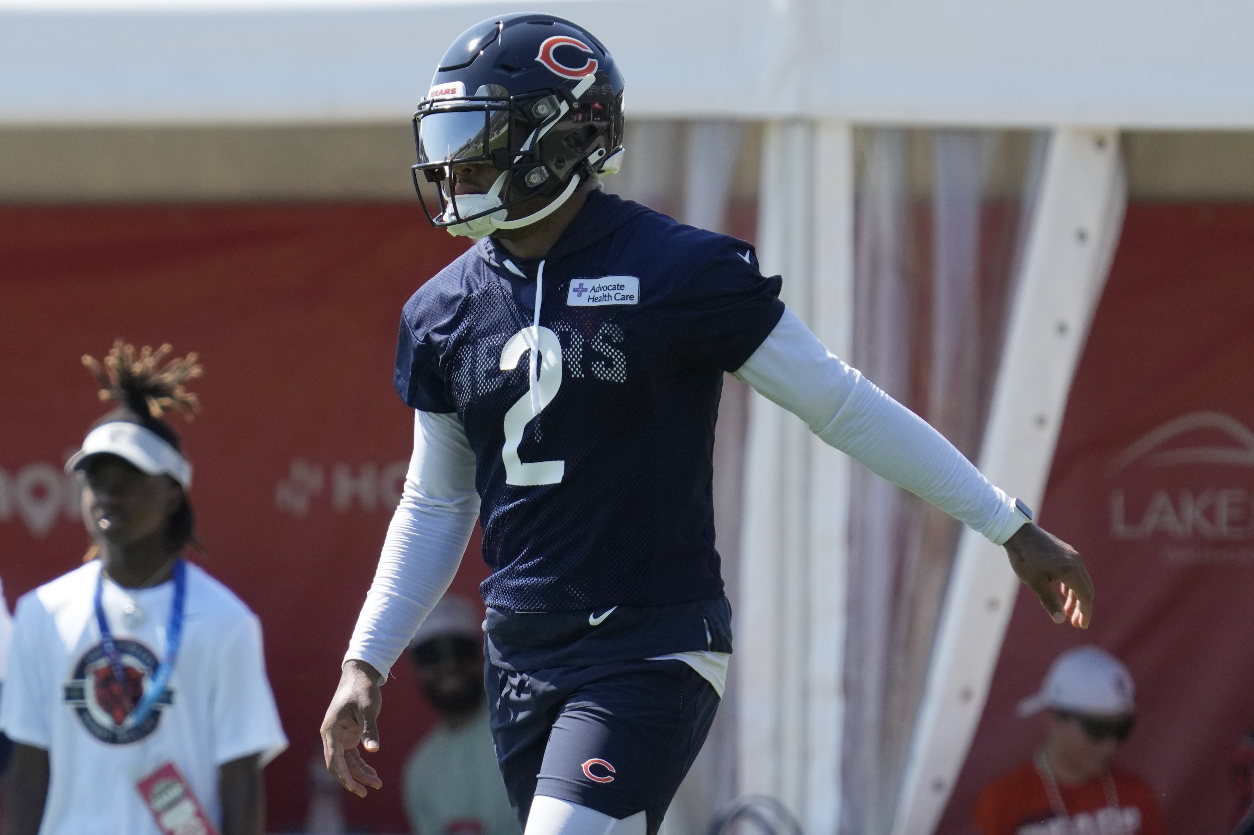 Chicago Bears new player wide receiver DJ Moore smiles as he listens to a  question from the media during an NFL football news conference at Halas  Hall in Lake Forest, Ill., Thursday