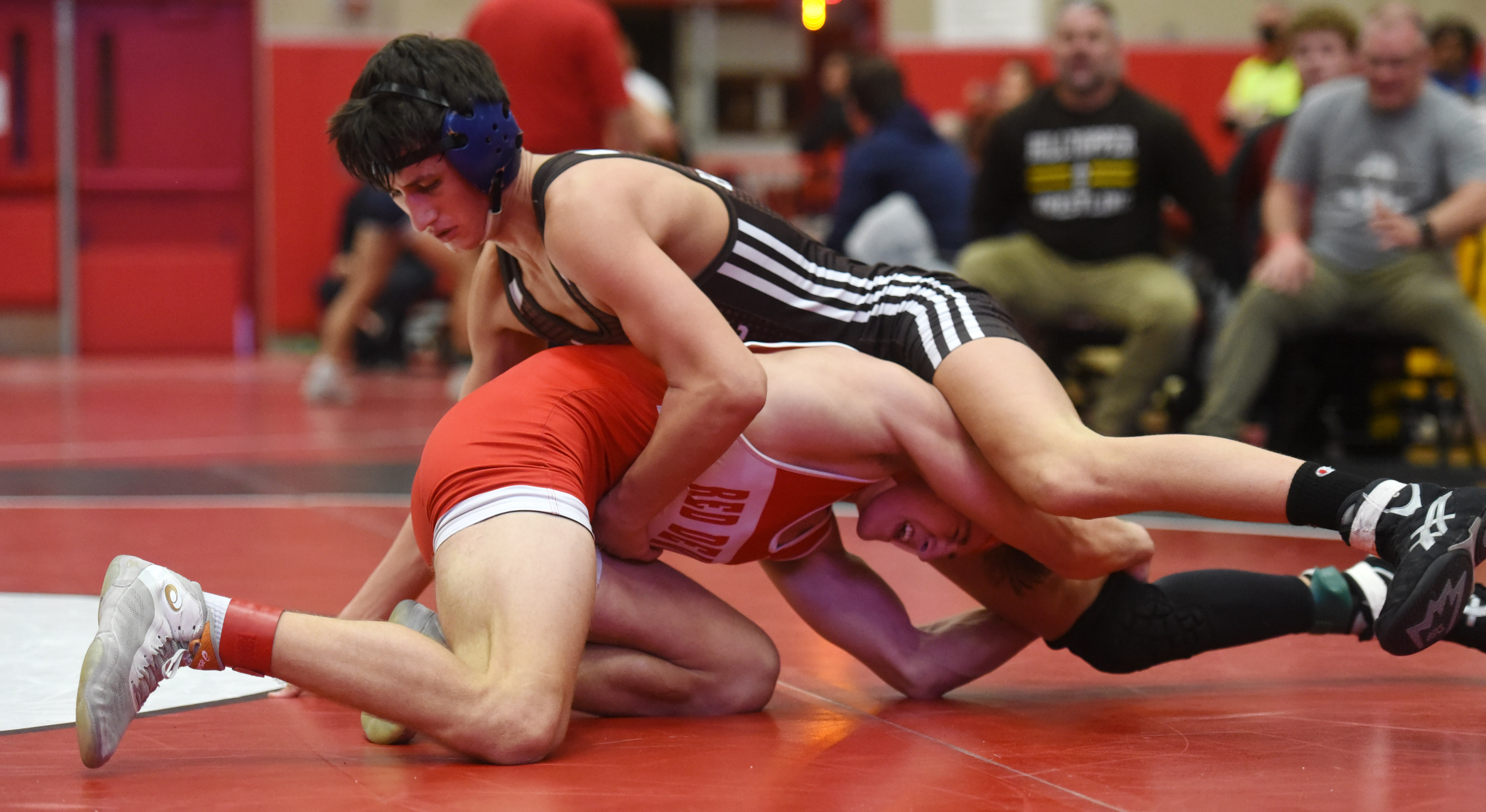 Wrestling Area grapplers battle through tough brackets to take titles