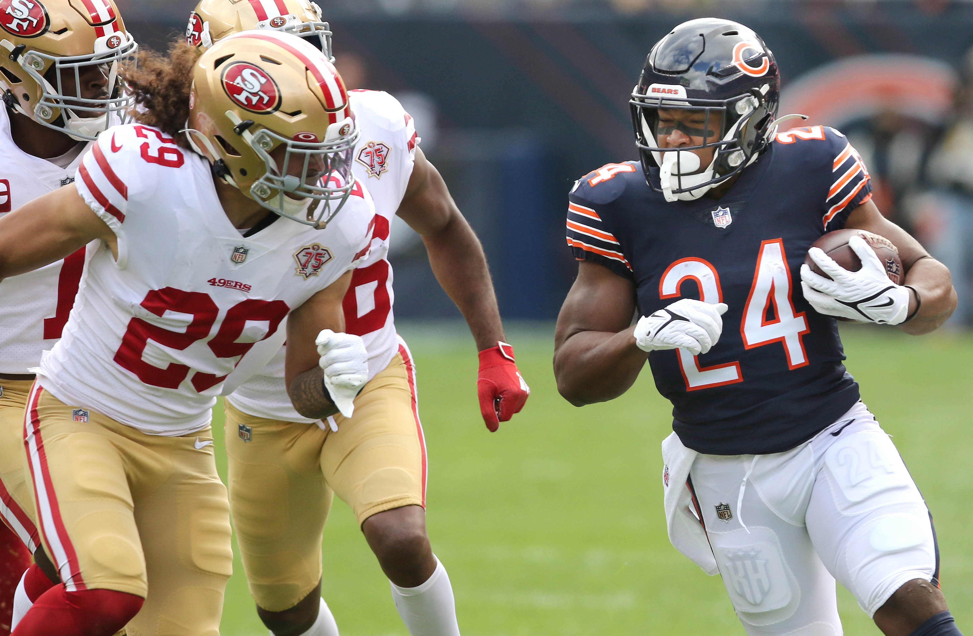 Khalil Herbert of the Chicago Bears runs against the San Francisco