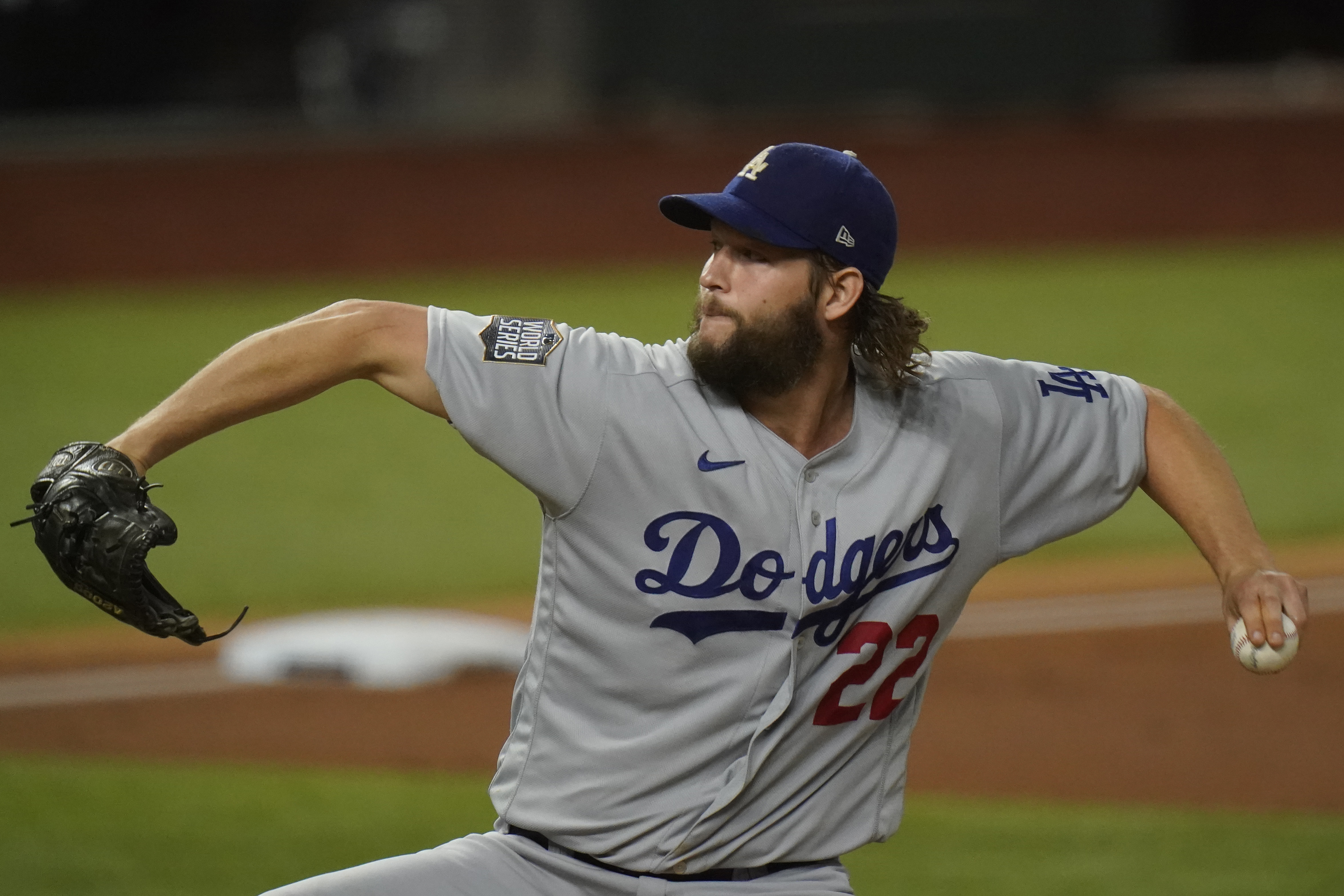 Clayton Kershaw throws a bullpen session as he works toward return