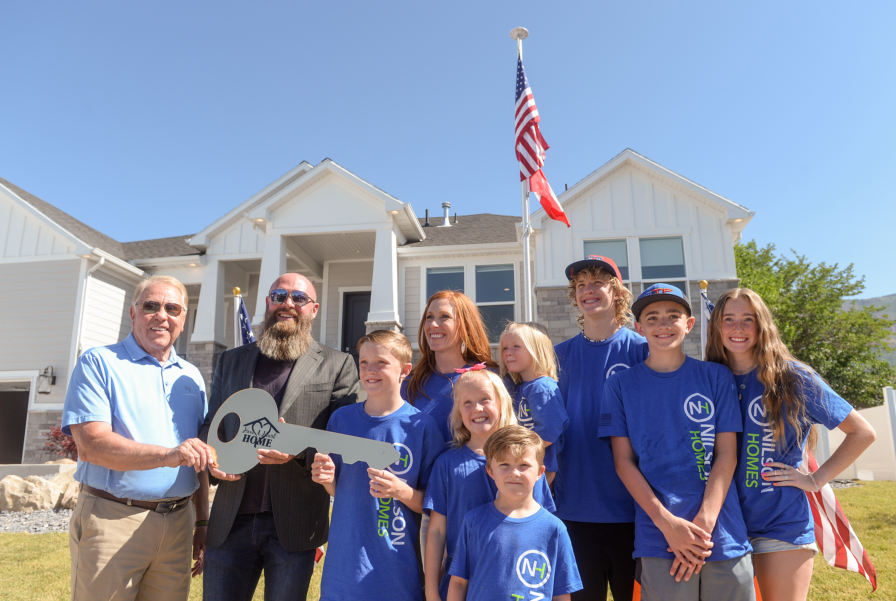 So much more than a house': Widow, kids of North Ogden Mayor Brent Taylor  receive new home