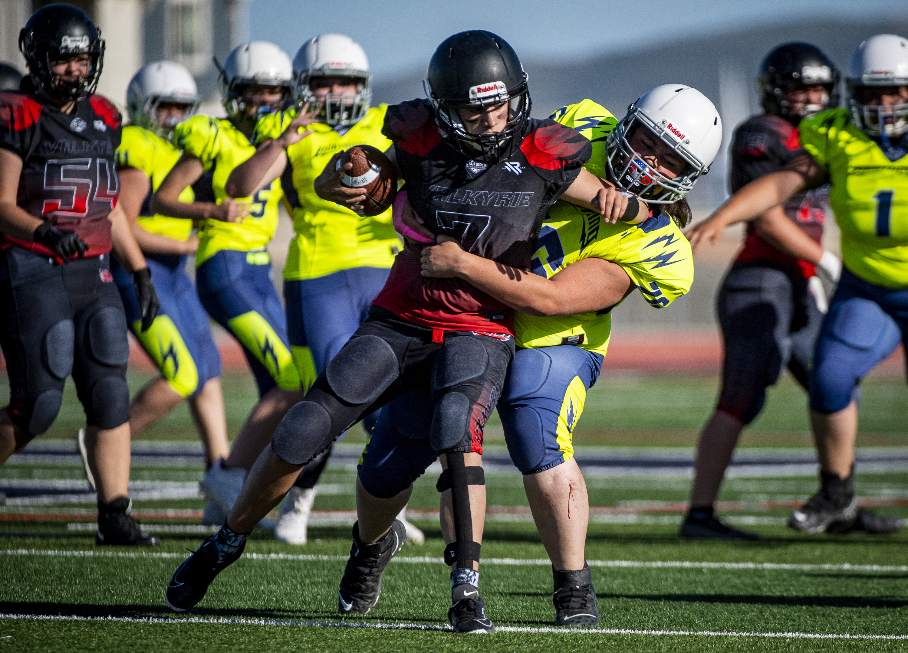 Here's what spirit, speed and grit looked like at championship games in the  Utah Girls Tackle Football League