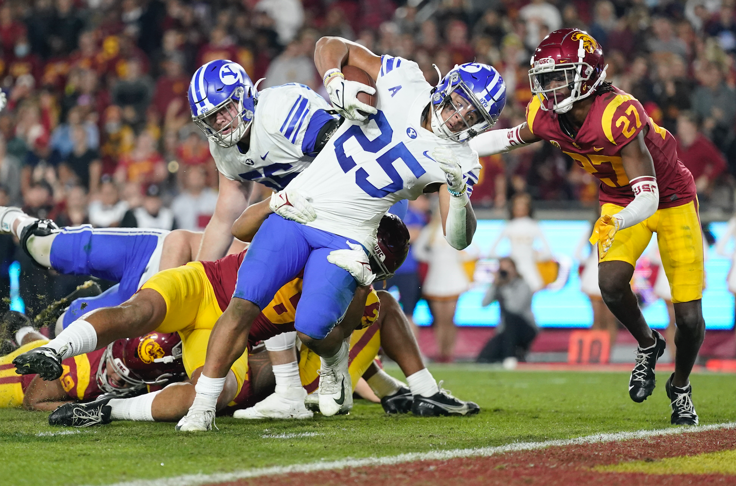 BYU running back Tyler Allgeier (25) takes knee during an NCAA college  football game against Virginia Saturday, Oct. 30, 2021, in Provo, Utah. (AP  Photo/George Frey Stock Photo - Alamy